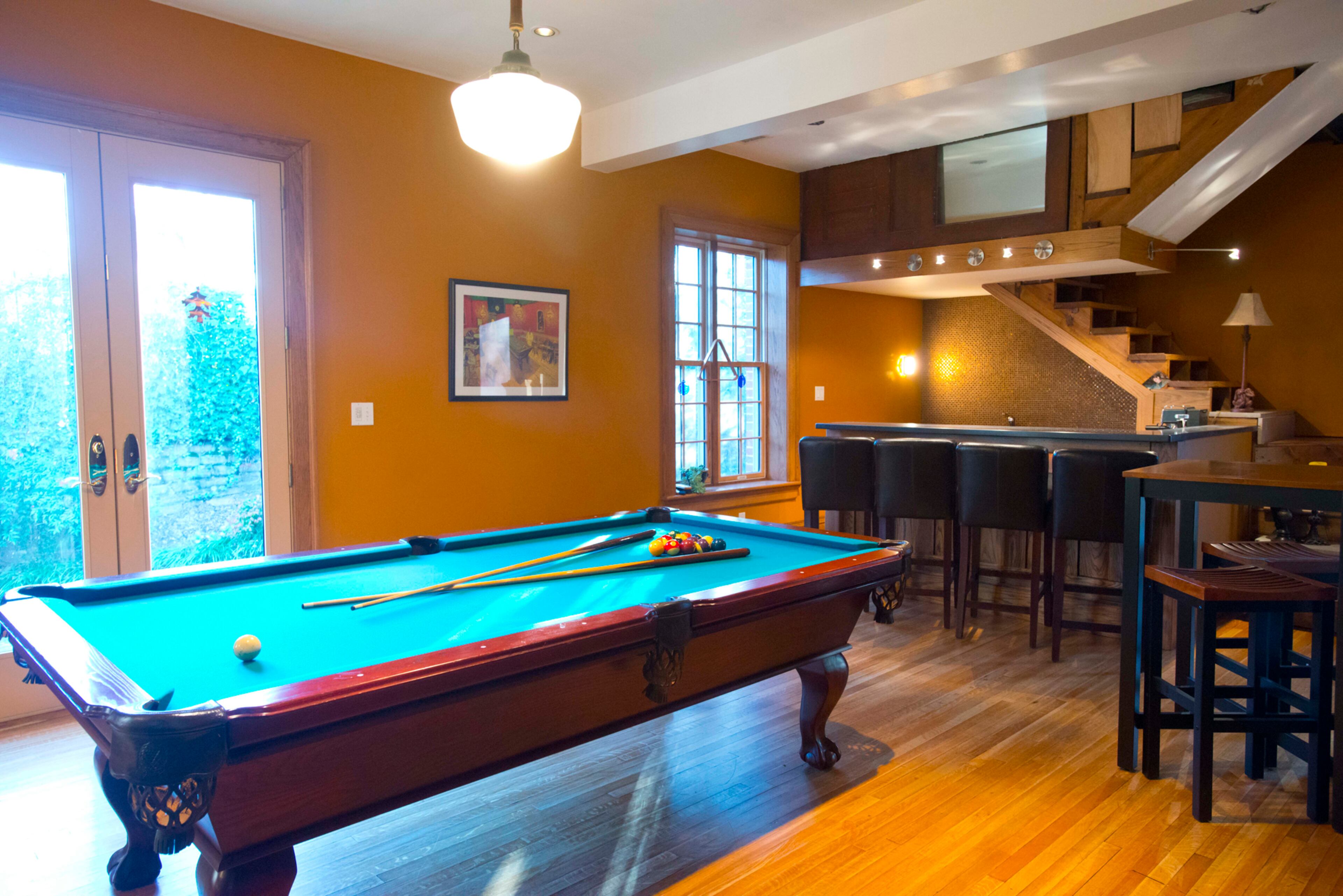 Having a pool table in the house is fitting with the way they use the space by entertaining often, Huff says.