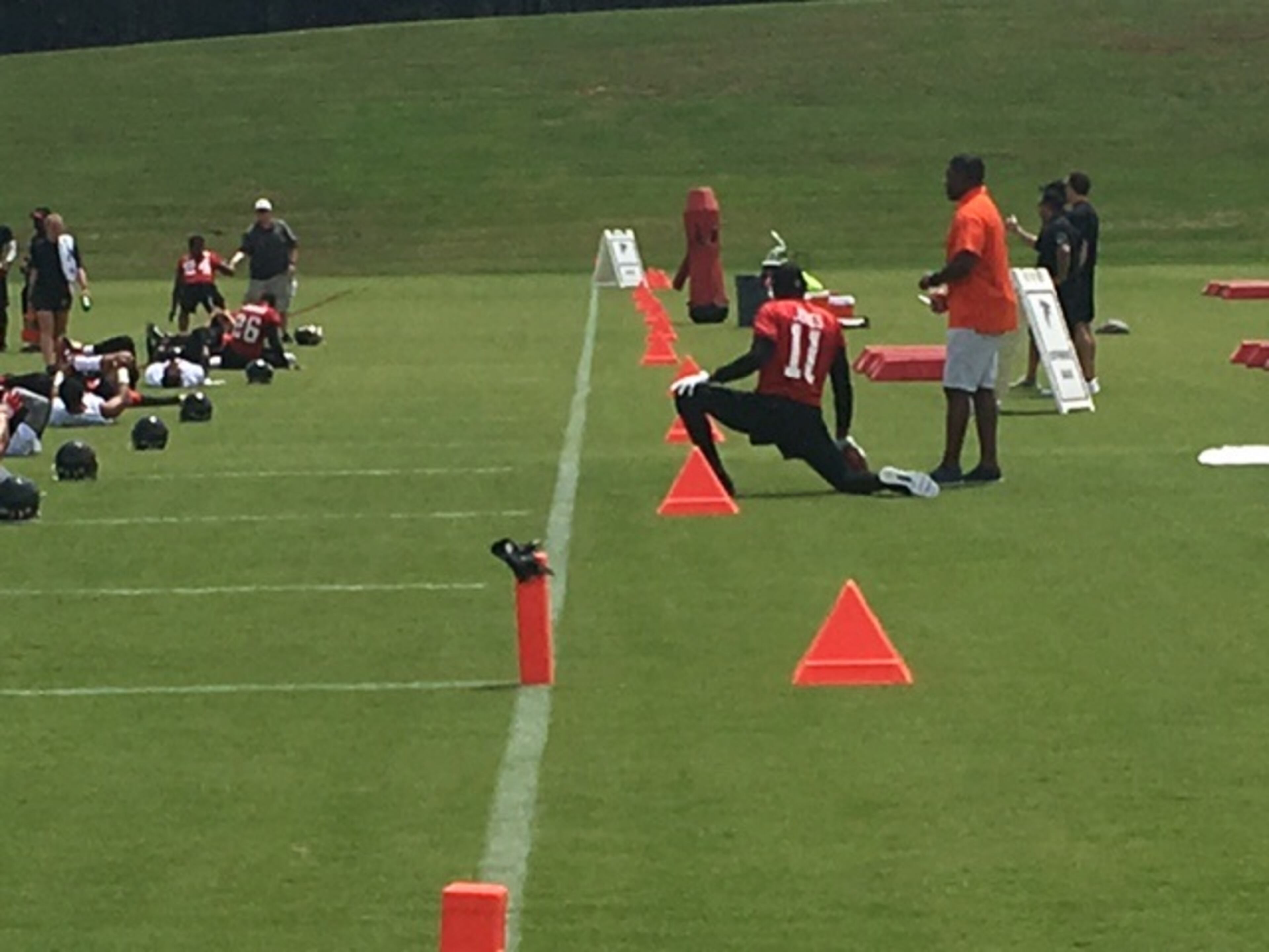 Falcons All-Pro wide receiver Julio Jones off to the sideline at OTAs on Thursday, June 1, 2017. (By D. Orlando Ledbetter/dledbetter@ajc.com)