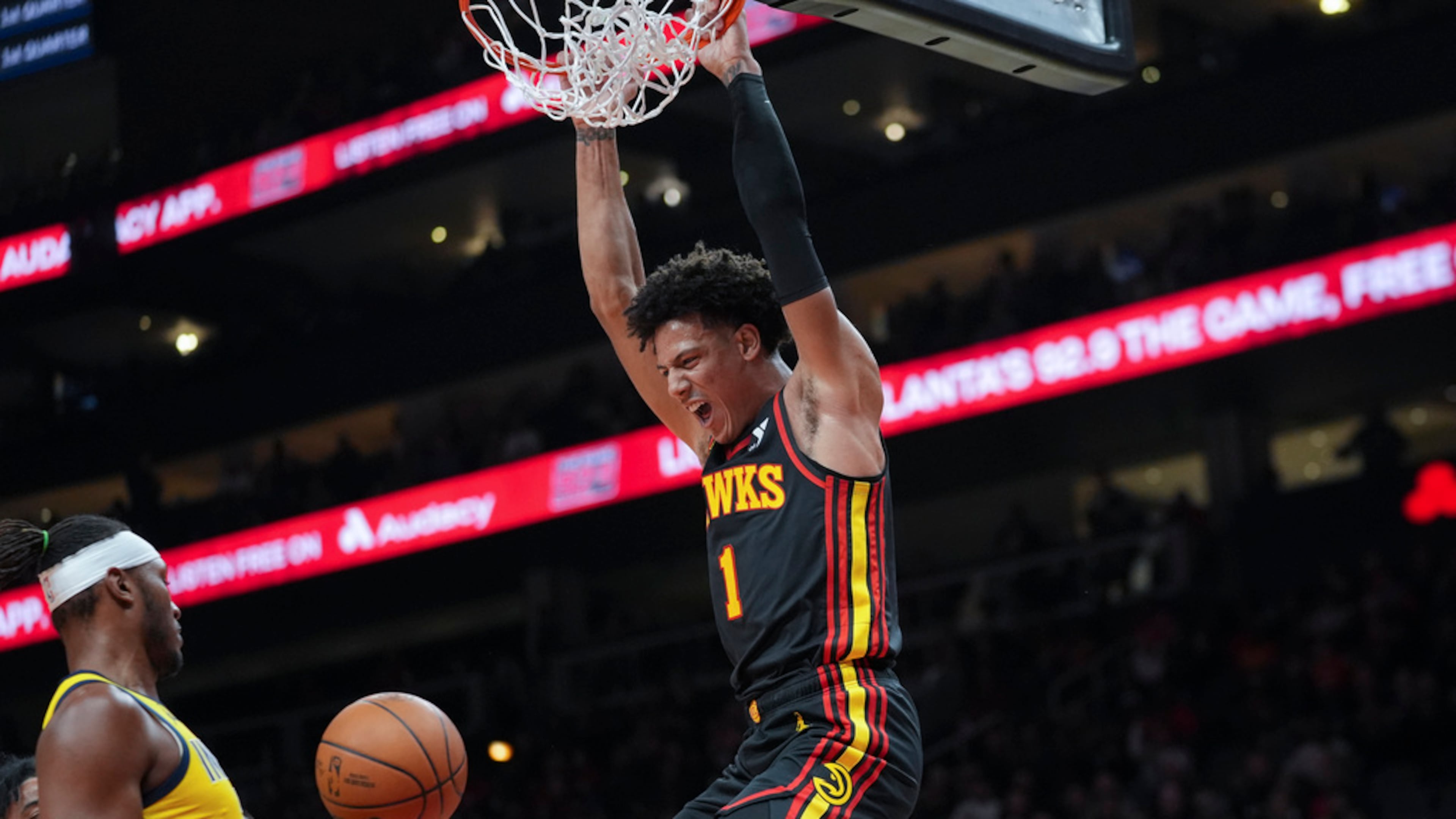 Atlanta Hawks forward Jalen Johnson scores against Indiana Pacers center Myles Turner during the first half of an NBA basketball game Friday, Jan. 12, 2024, in Atlanta. (John Bazemore/AP)