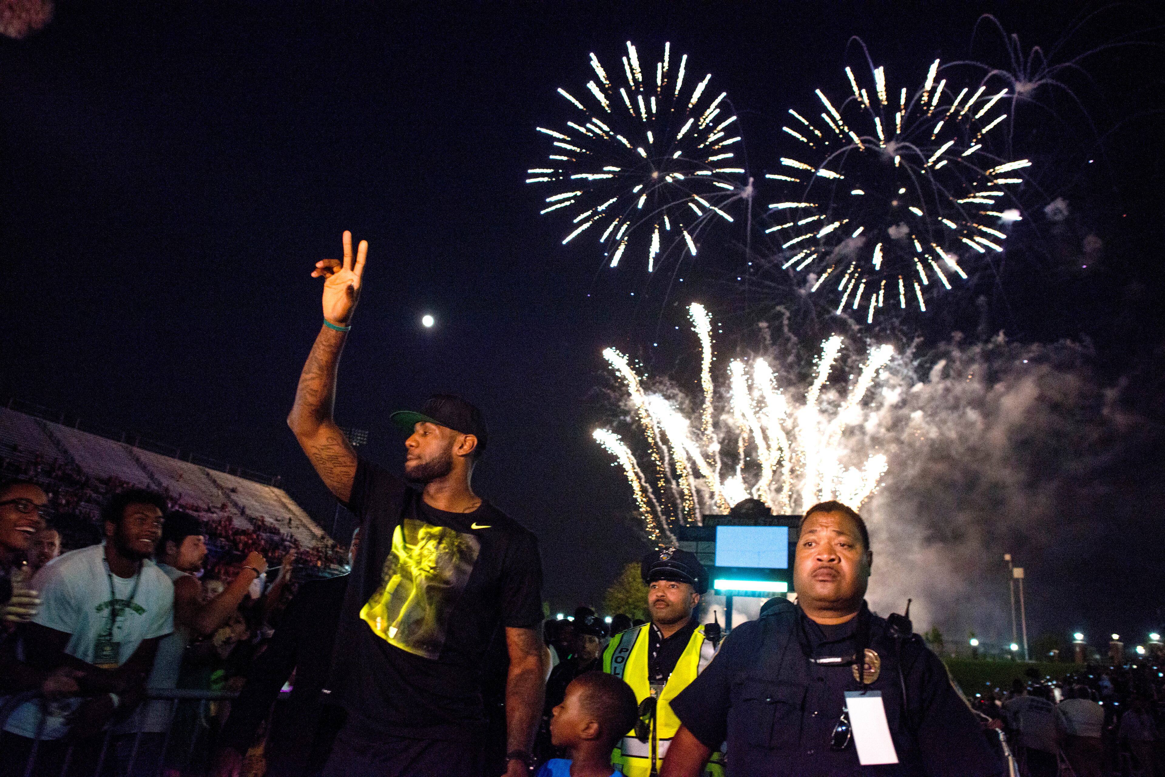 LeBron James waves to his fans in the city of Akron after taking the stage during his Welcome Home Ceremony at Infocision Stadium at the University of Akron on August 8, 2014 in Akron, Ohio. (Photo by Ty Wright/Getty Images)
