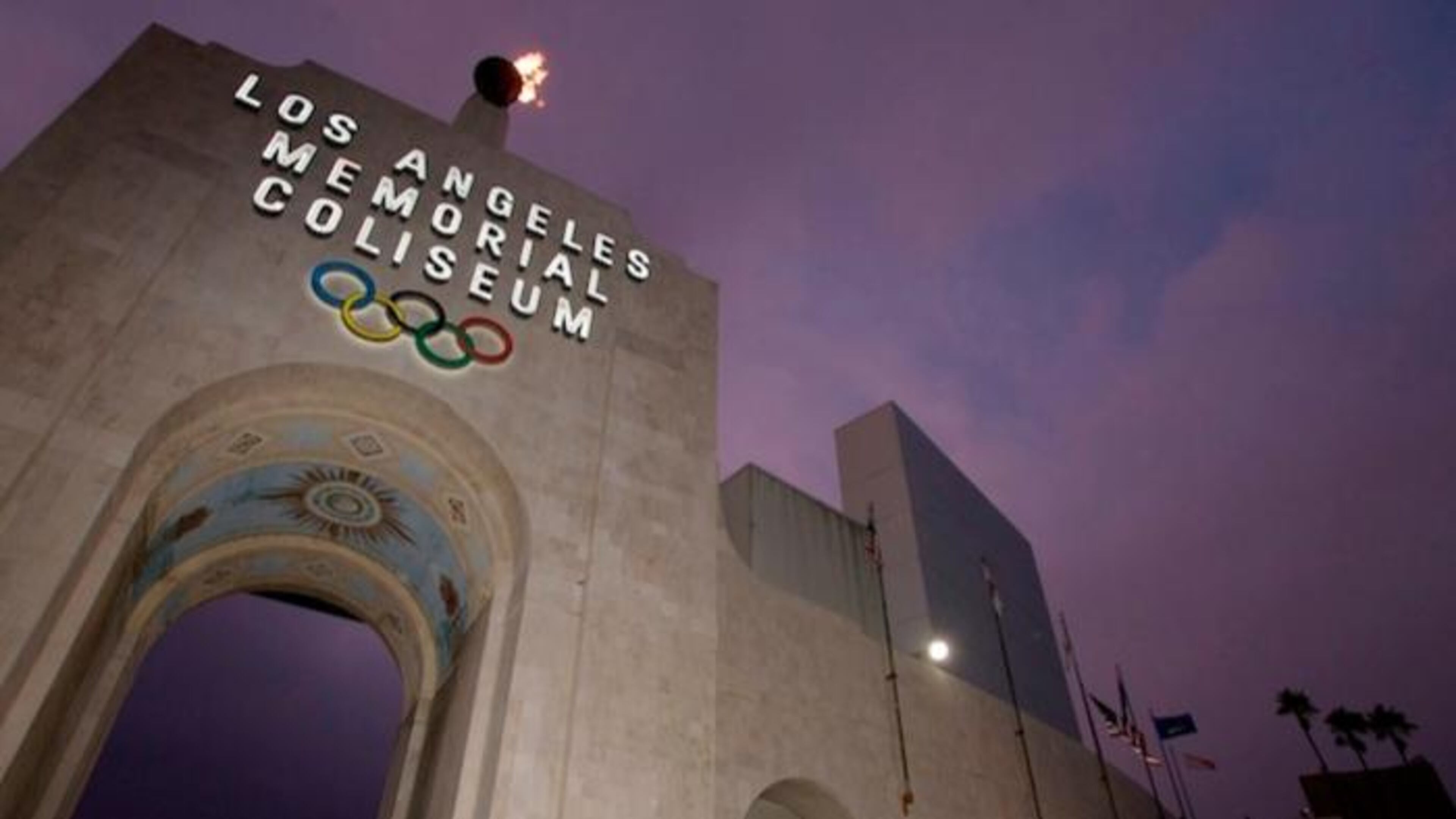 FILE - This Feb. 13, 2008, file photo shows the Los Angeles Memorial Coliseum in Los Angeles. The aging Los Angeles Memorial Coliseum is slated for a major overhaul, but it’s not known how much work will be needed to harden the structure against earthquakes in time to make a credible bid for the 2024 Olympics. The 1994 Northridge earthquake heavily damaged the stadium, even though it was 20 miles from the epicenter and the strongest shaking traveled away from the Coliseum (AP Photo/Damian Dovarganes, File)