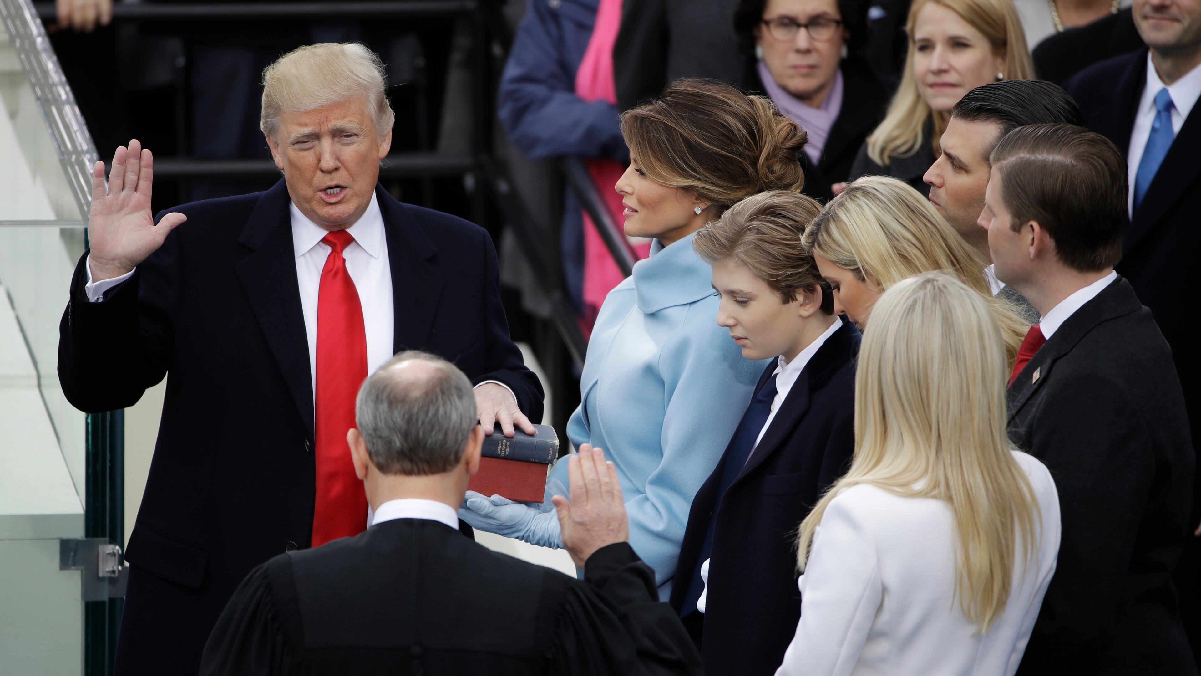 Donald Trump is sworn in as the 45th president of the United States by Chief Justice John Roberts as Melania Trump looks on during the 58th Presidential Inauguration at the U.S. Capitol in Washington, Friday, Jan. 20, 2017. (AP Photo/Matt Rourke)