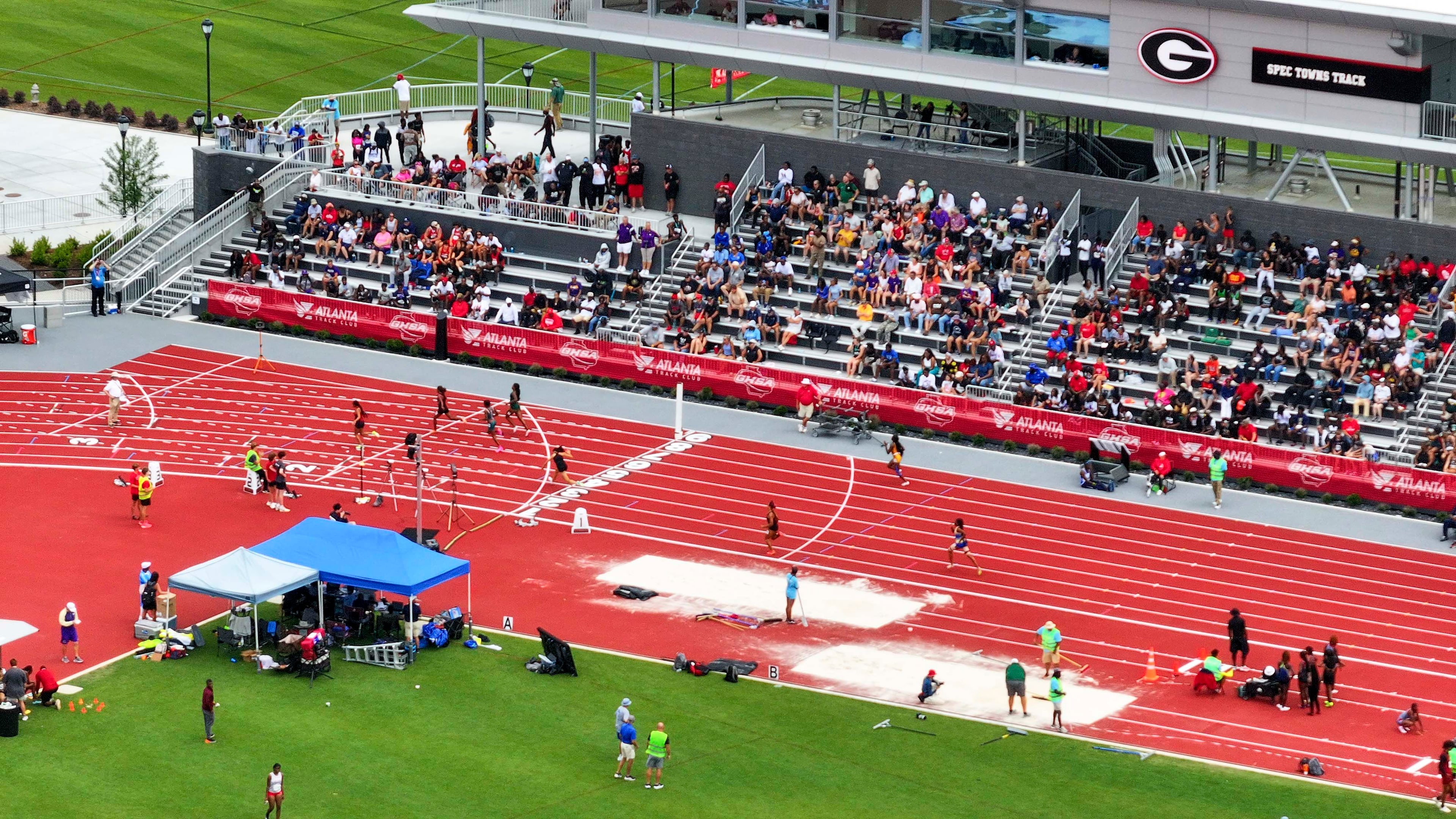 An aerial image depicts the UGA Spec Towns Track where the GHSA track and field state championship is taking place on Monday, May 11, 2026, in Athens. (Miguel Martinez/AJC)