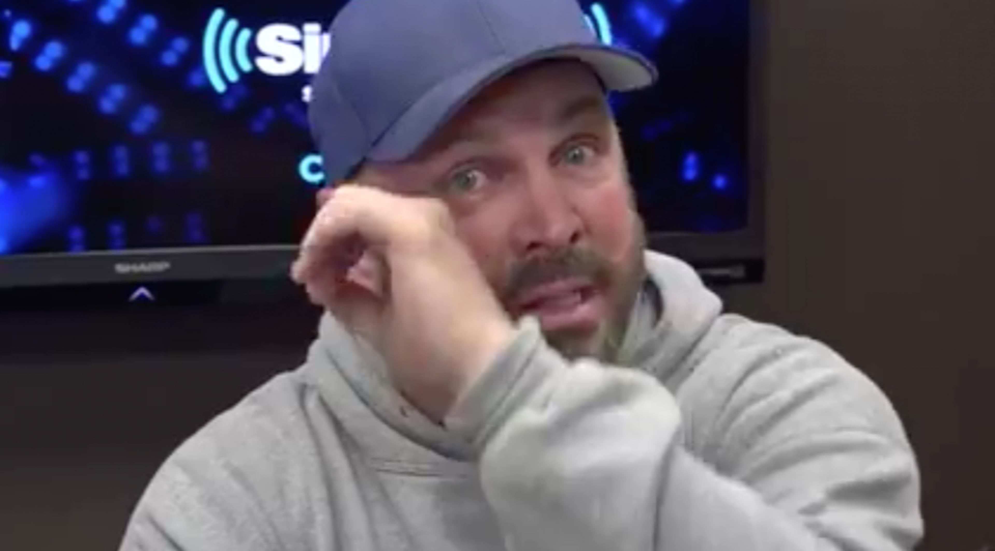 Country music star Garth Brooks becomes emotional while performing a song he wrote for the “March For Our Lives” protesters.