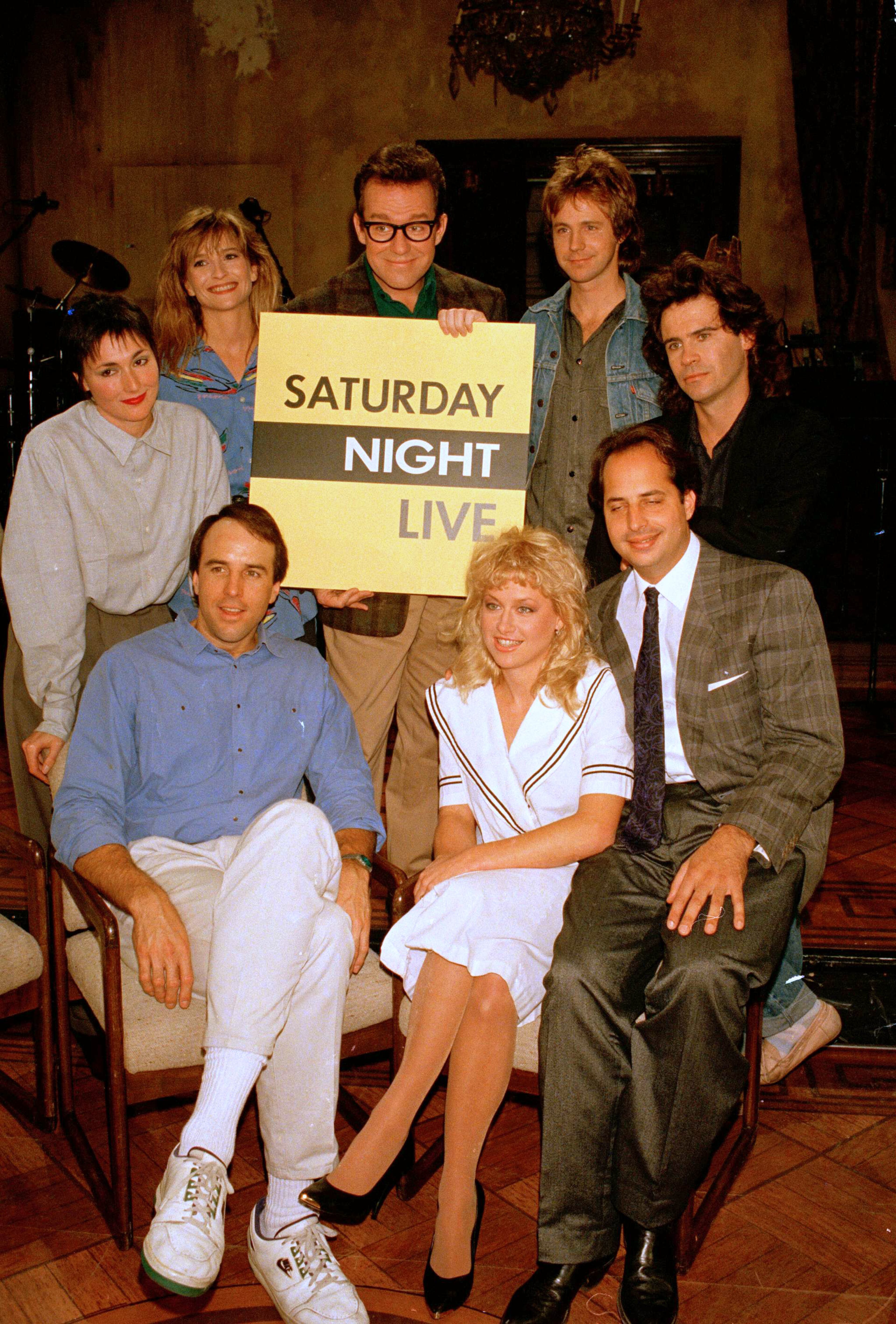 In this Dec. 9, 1986 file photo, the cast of NBC's "Saturday Night Live," clockwise, from left, Nora Dunn, Jan Hooks, Phil Hartman, Dana Carvey, Dennis Miller, Jon Lovitz, Victoria Jackson, and Kevin Nealon, pose together, in New York. Hooks, the former "Saturday Night Live" cast member has died. She was 57. Hooks died Thursday, Oct. 9, 2014 according to her agent Lisa Lieberman. (AP Photo/Richard Drew, file)