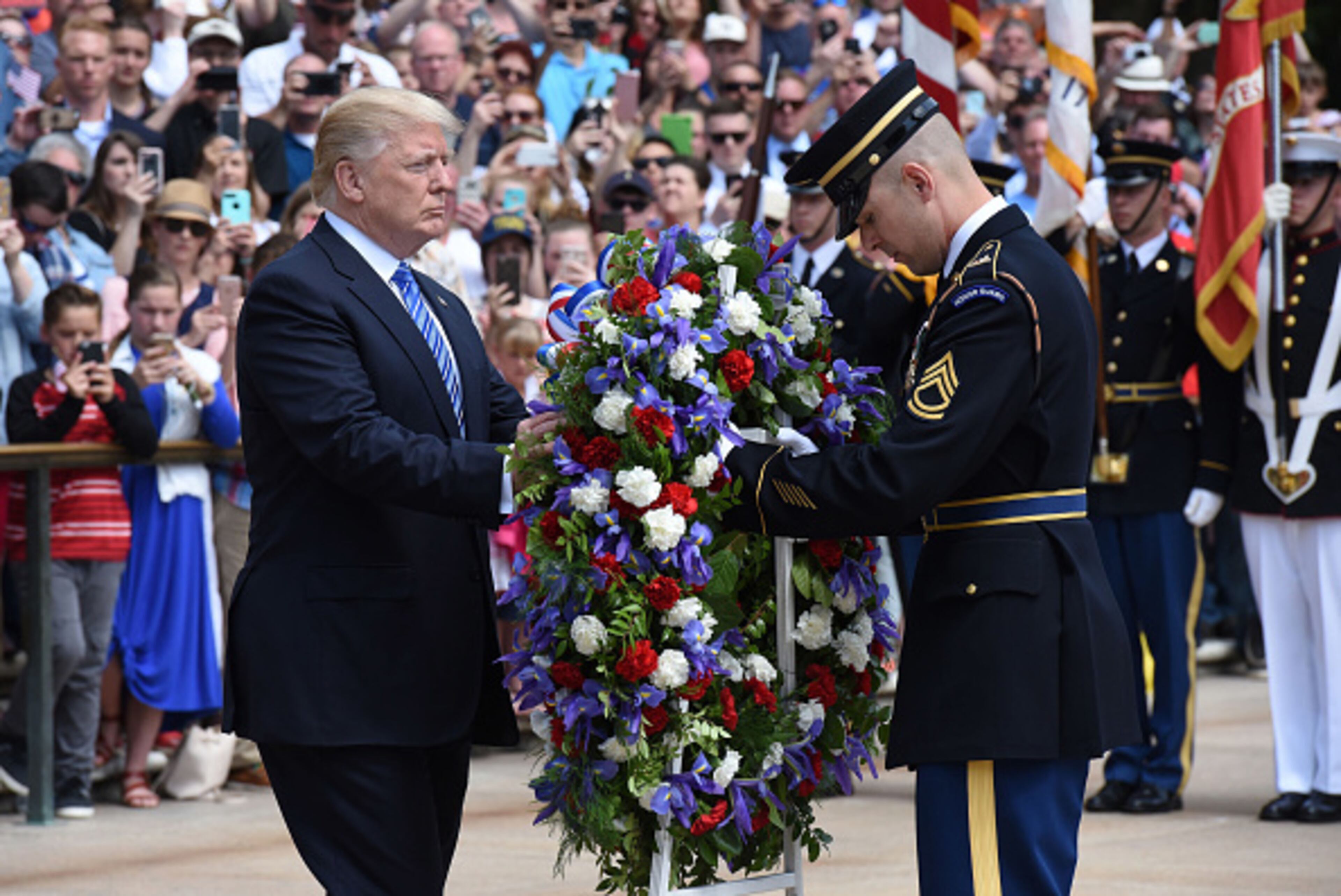 ARLINGTON, VA - MAY 29: President Donald Trump participates in a wreath-laying ceremony at the Tomb of the Unknown Soldier at Arlington National Cemetery on Memorial Day, May 29, 2017 in Arlington, Virginia. (Photo by Olivier Douliery - Pool/Getty Images)
