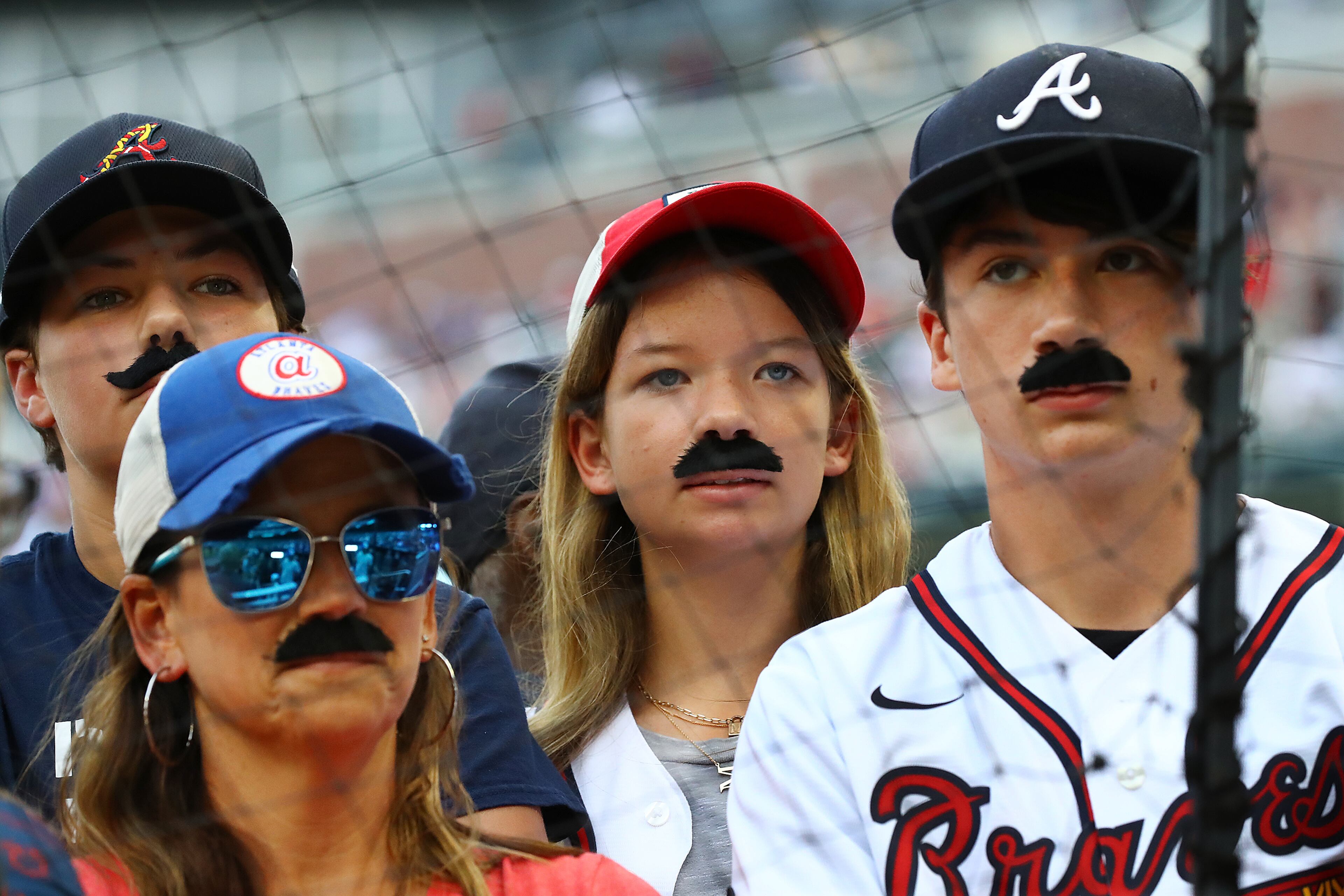 Atlanta Braves fans sport mustaches to show their support for starting pitcher Spencer Strider in game two of the series against the New York Mets in a MLB baseball game on Tuesday, July 12, 2022, in Atlanta. “Curtis Compton / Curtis Compton@ajc.com”