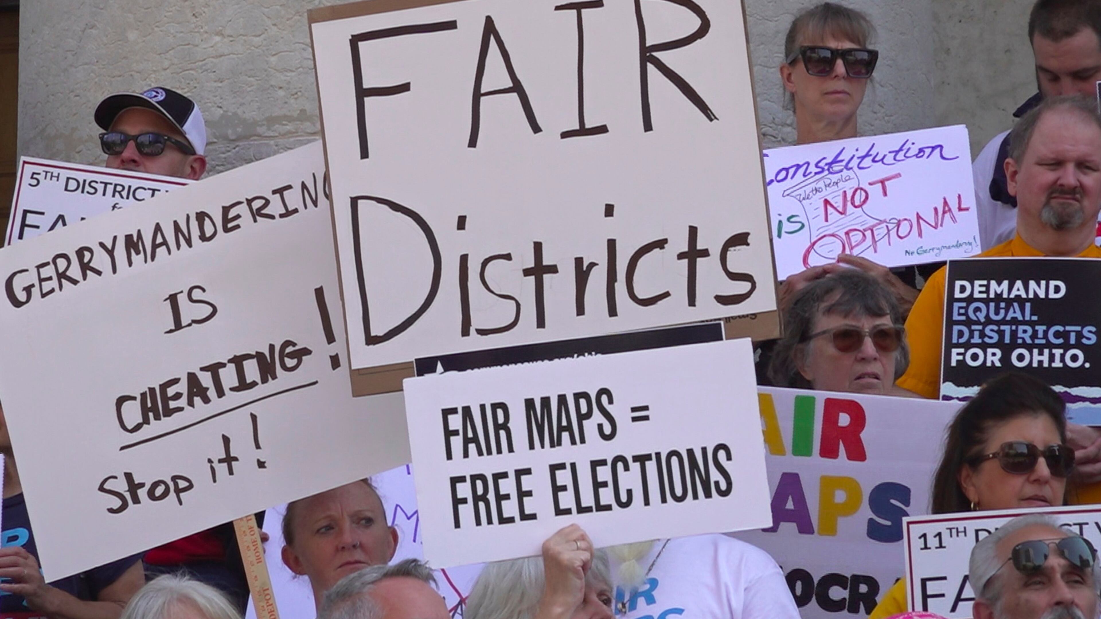 FILE - This photo taken from video shows organizers rallying outside of the Ohio Statehouse to protest gerrymandering and advocate for lawmakers to draw fair maps in Columbus, Ohio, Sept. 17, 2025. (AP Photo/Patrick Aftoora-Orsagos, File)