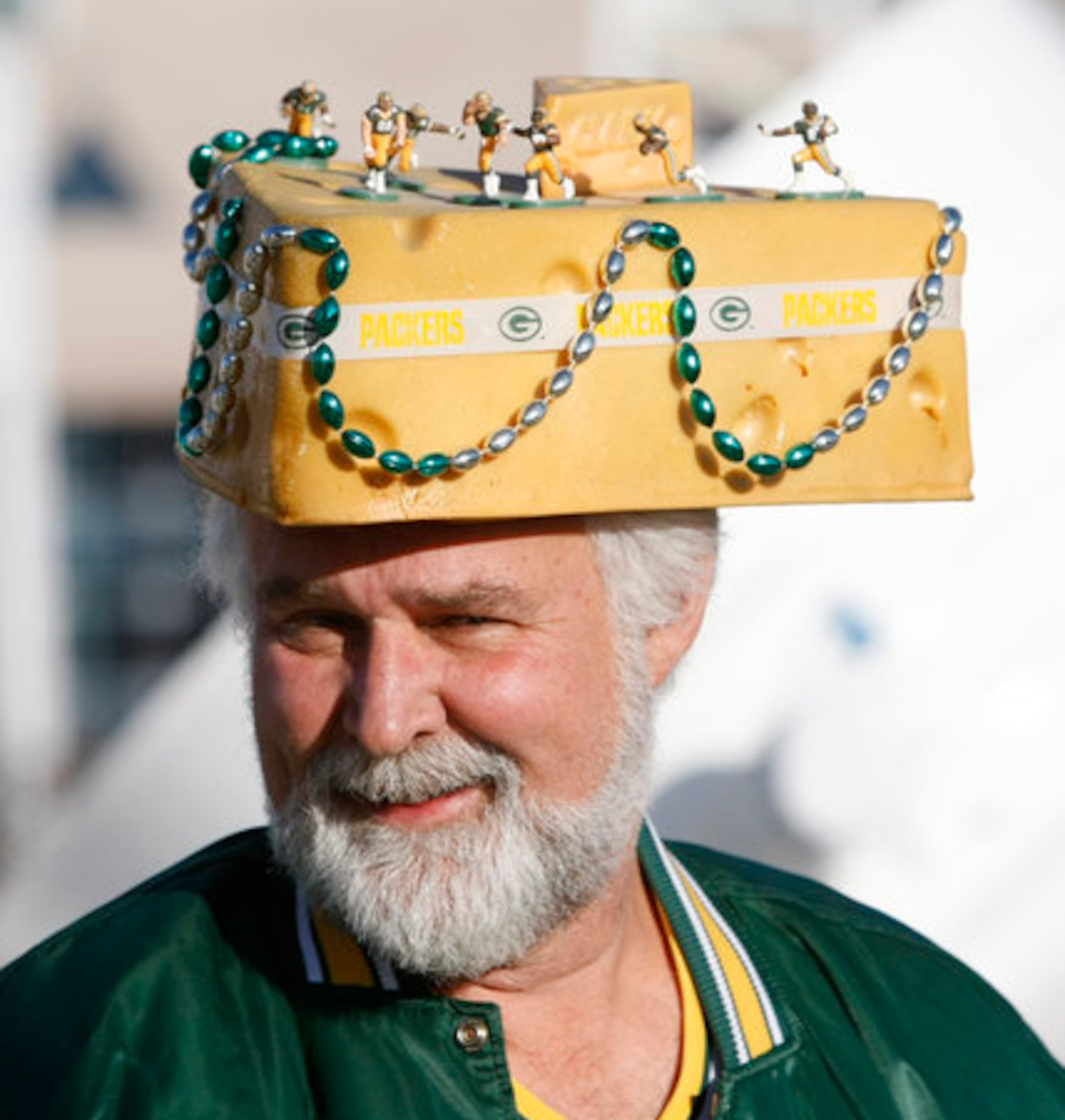Mike McDonald, Canton, sports a cheese head to the game to support the Packers against the Falcons at the Georgia Dome in Atlanta on Saturday, Jan. 15, 2011.