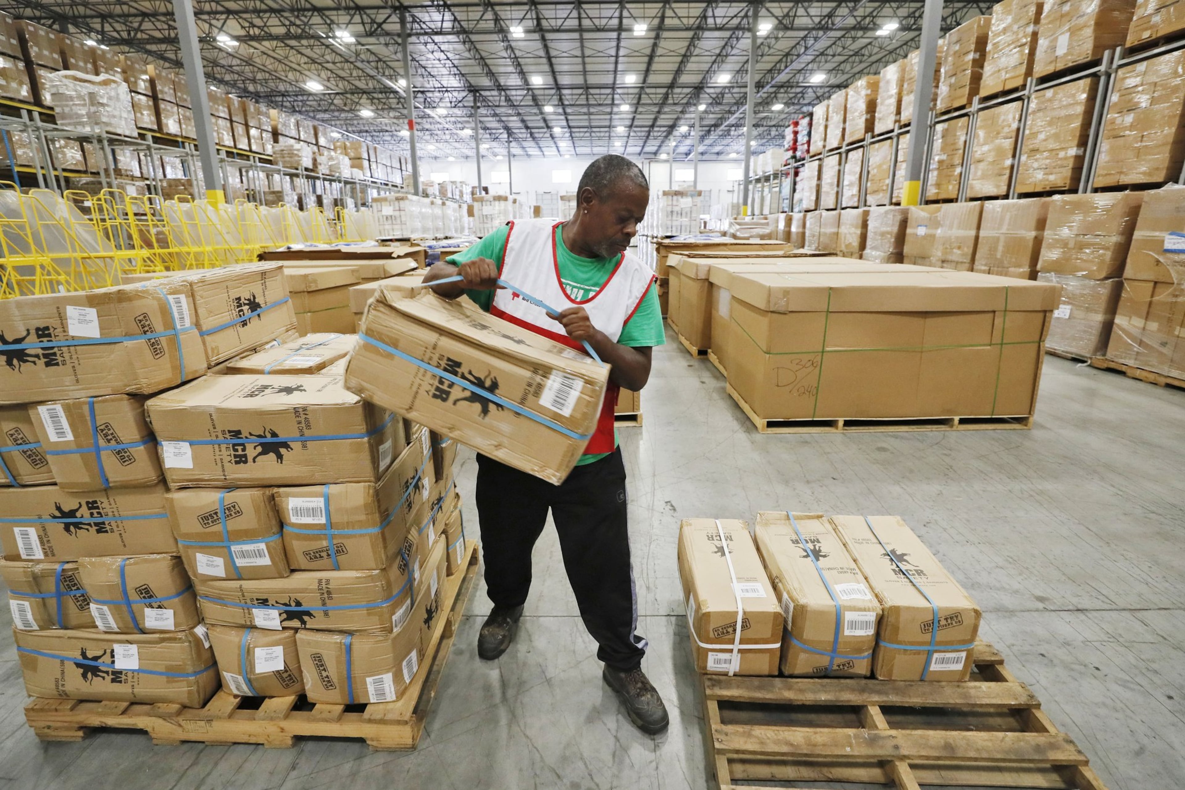 10/11/18 - - Union City - Red Cross workers stage and load supplies to be shipped to hurricane ravaged areas from their mega warehouse in Union City, one of five large regional warehouses located throughout the country. Bob Andres / bandres@ajc.com