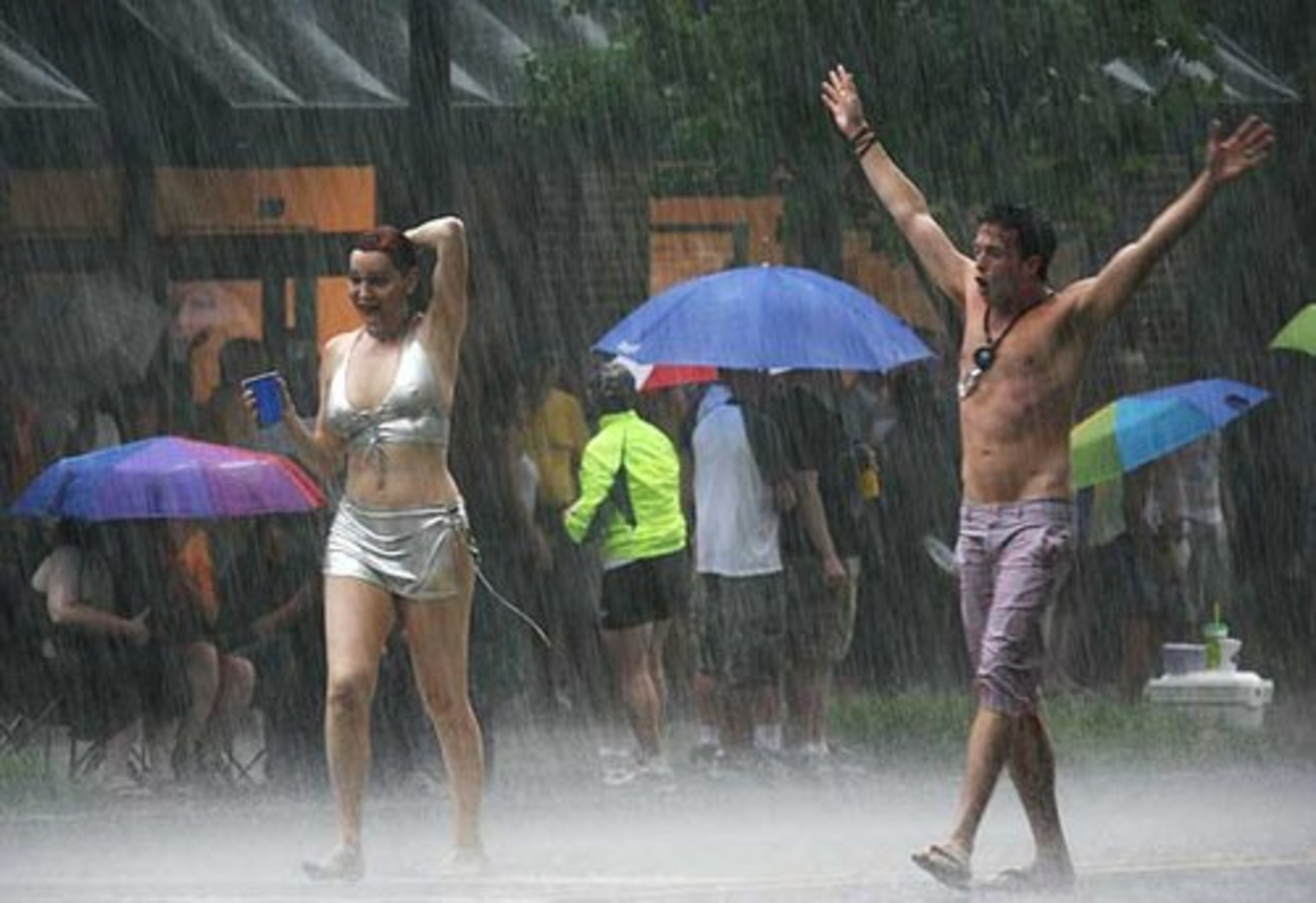 Among those braving the downpour to parade down Peachtree were Calpernia Addams from the LOGO network and Jason Dottley, star of 'Sordid Lives.'