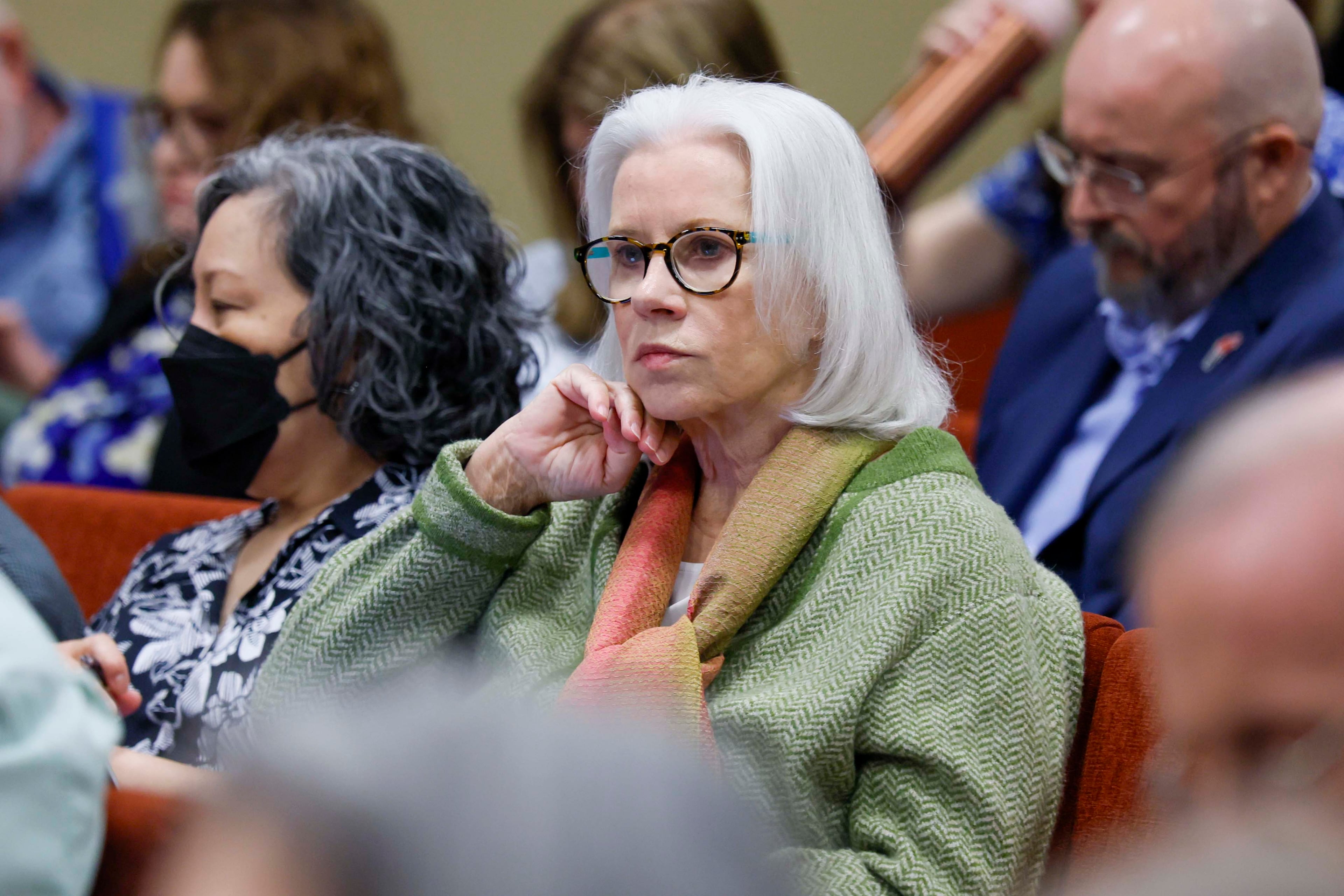 Marilyn Marks, executive director of the Coalition for Good Governance, listens to speakers during a State Election Board meeting at the Dawson County Government Center on Wednesday, April 15, 2026. (Miguel Martinez/AJC)