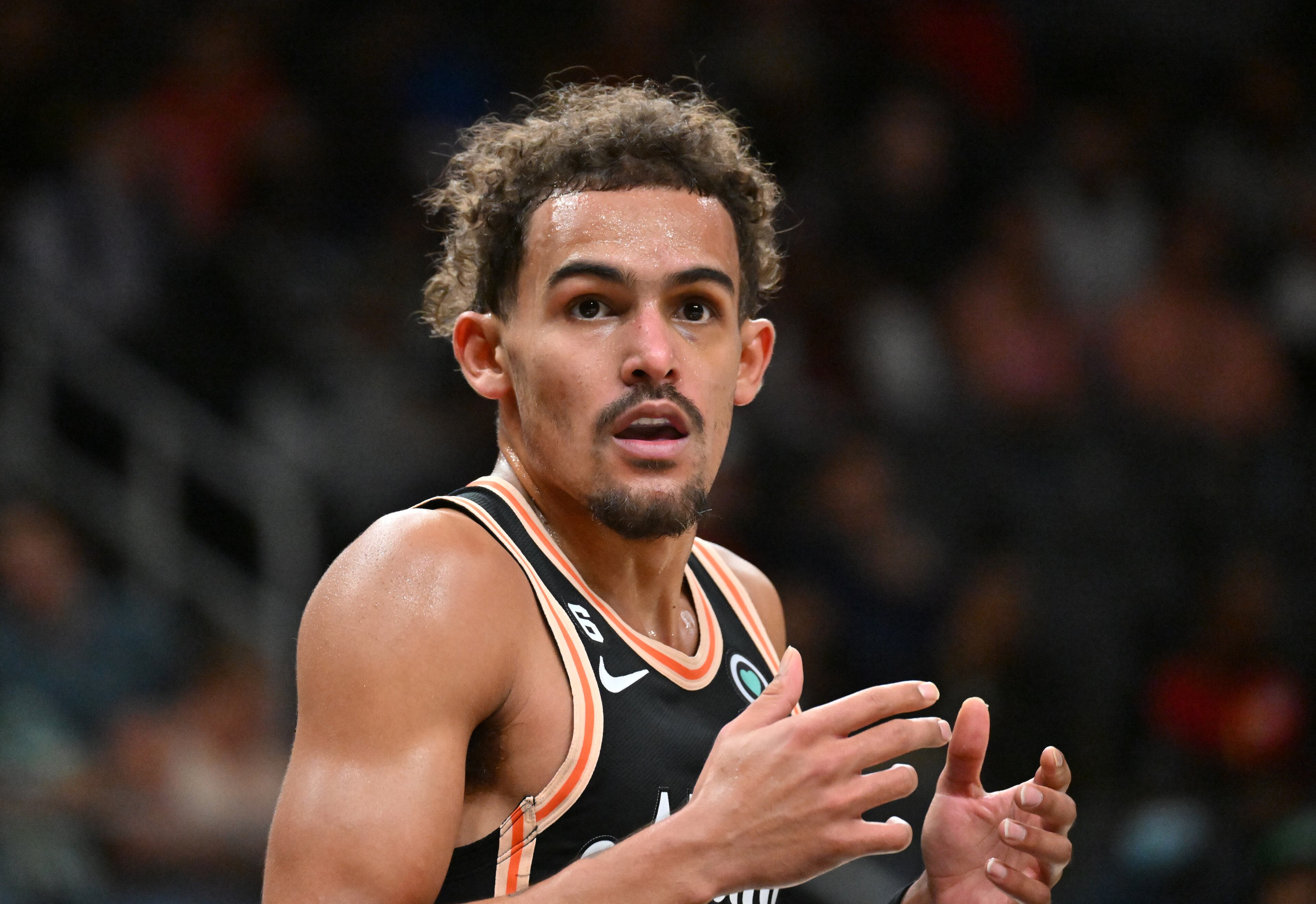 Hawks' guard Trae Young (11) reacts during the first half in an NBA basketball game at State Farm Arena on Thursday, November 10, 2022. (Hyosub Shin / Hyosub.Shin@ajc.com)