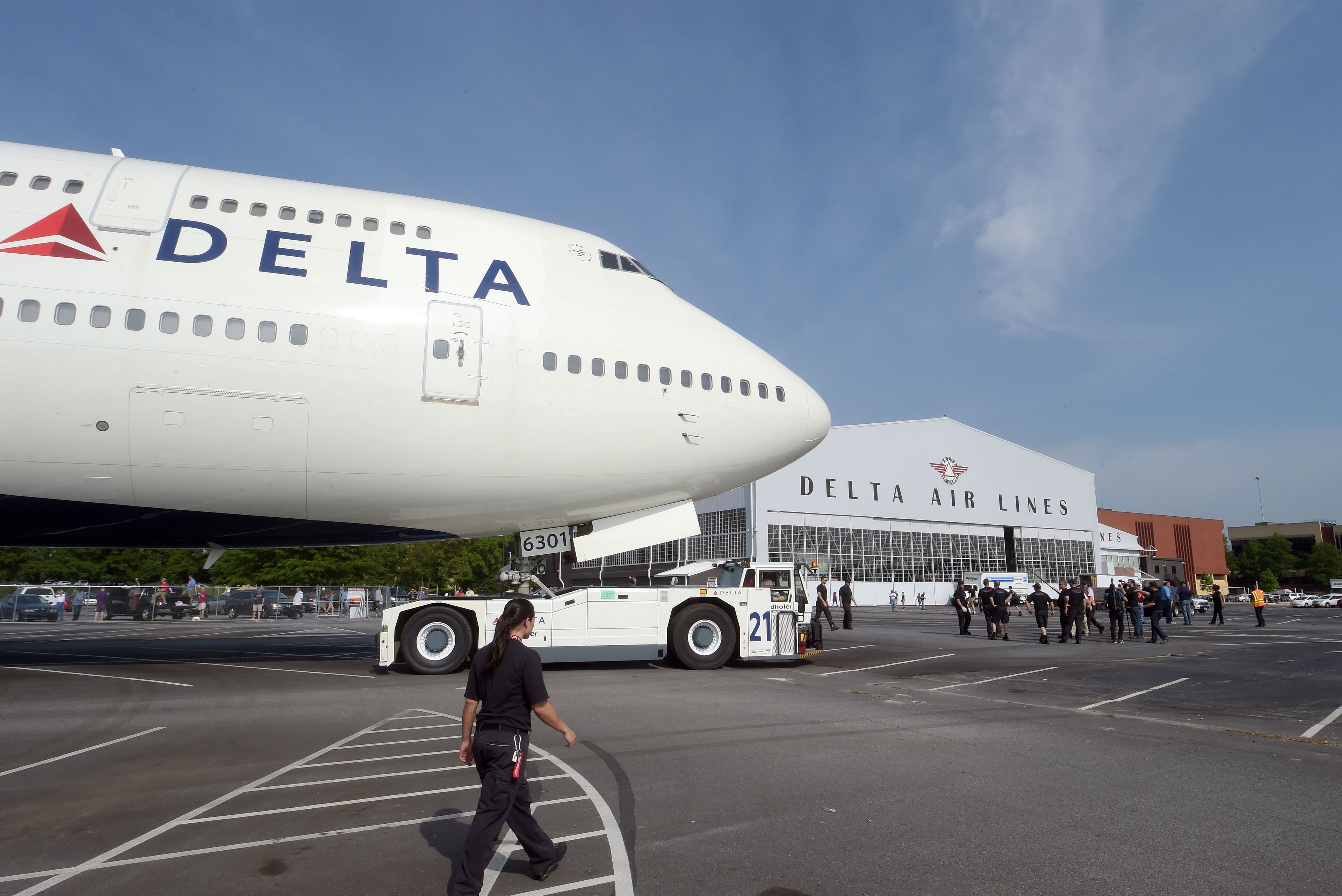 APRIL 30, 2016 ATLANTA The plane is moved to a temporary spot in the Delta flight museum parking lot. It will join several other aircraft when it goes on display in early 2017. KENT D. JOHNSON /kdjohnson@ajc.com #delta747experience