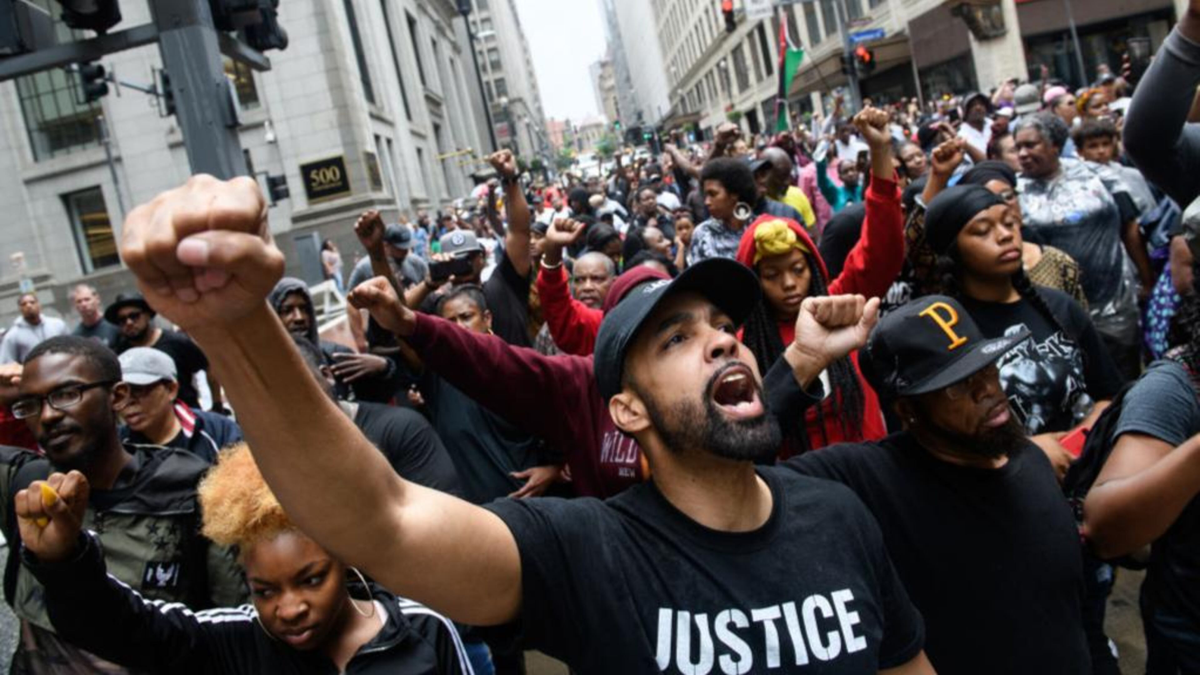 PITTSBURGH, PA - JUNE 23: Protestors join a march for the police shooting of Antwon Rose during a Juneteenth celebration on June 23, 2018 in Pittsburgh, Pennsylvania. Rose, an unarmed black teenager, was shot Tuesday night, leading to protests and outraged across the city. Juneteenth commemorates the June 19, 1865, announcement of the abolition of slavery in the U.S. state of Texas. (Photo by Justin Merriman/Getty Images)