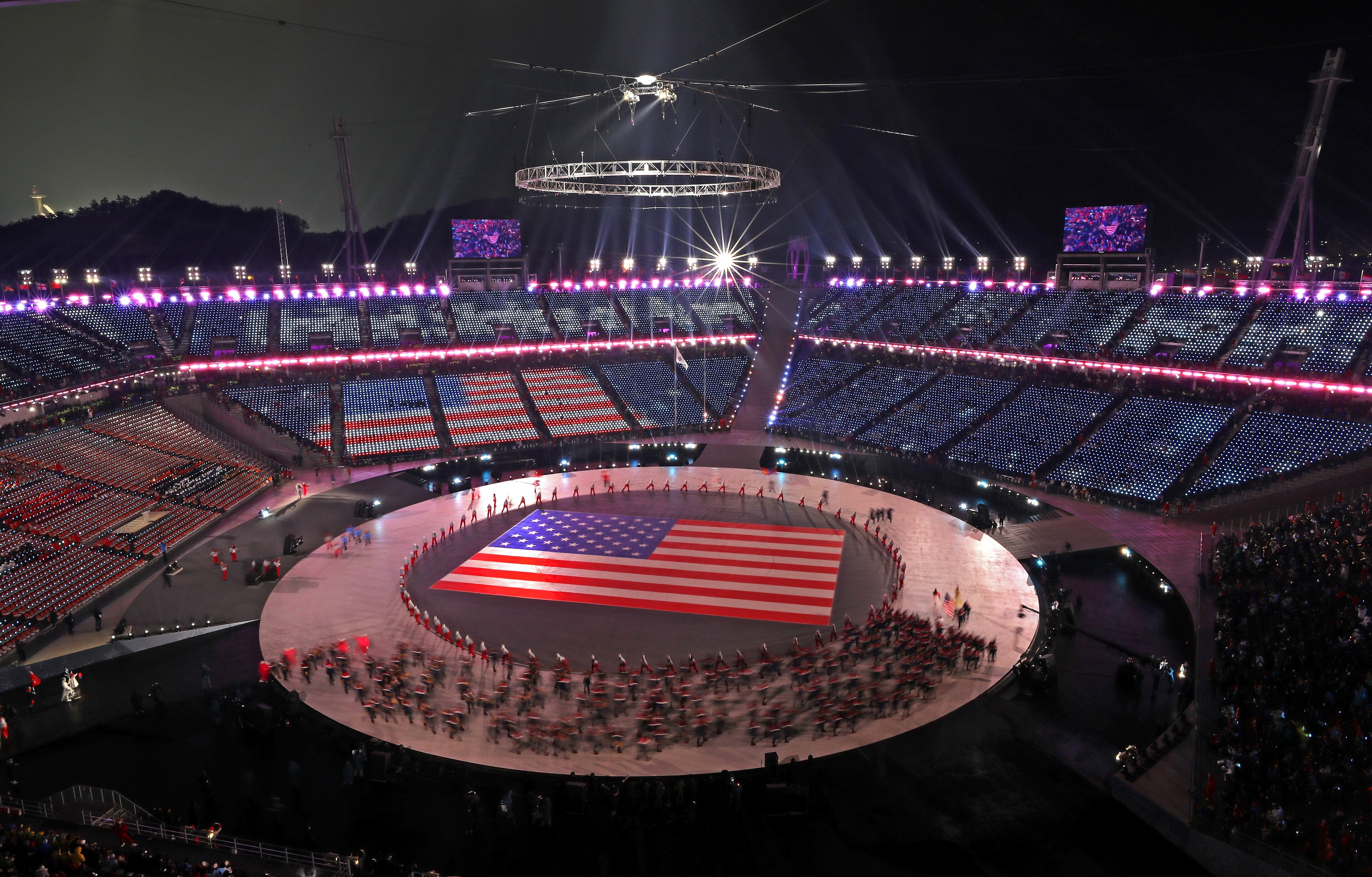 PYEONGCHANG-GUN, SOUTH KOREA - FEBRUARY 09: A general view as Flag bearer Erin Hamlin of the United States and teammates enter the stadium during the Opening Ceremony of the PyeongChang 2018 Winter Olympic Games at PyeongChang Olympic Stadium on February 9, 2018 in Pyeongchang-gun, South Korea. (Photo by Richard Heathcote/Getty Images)