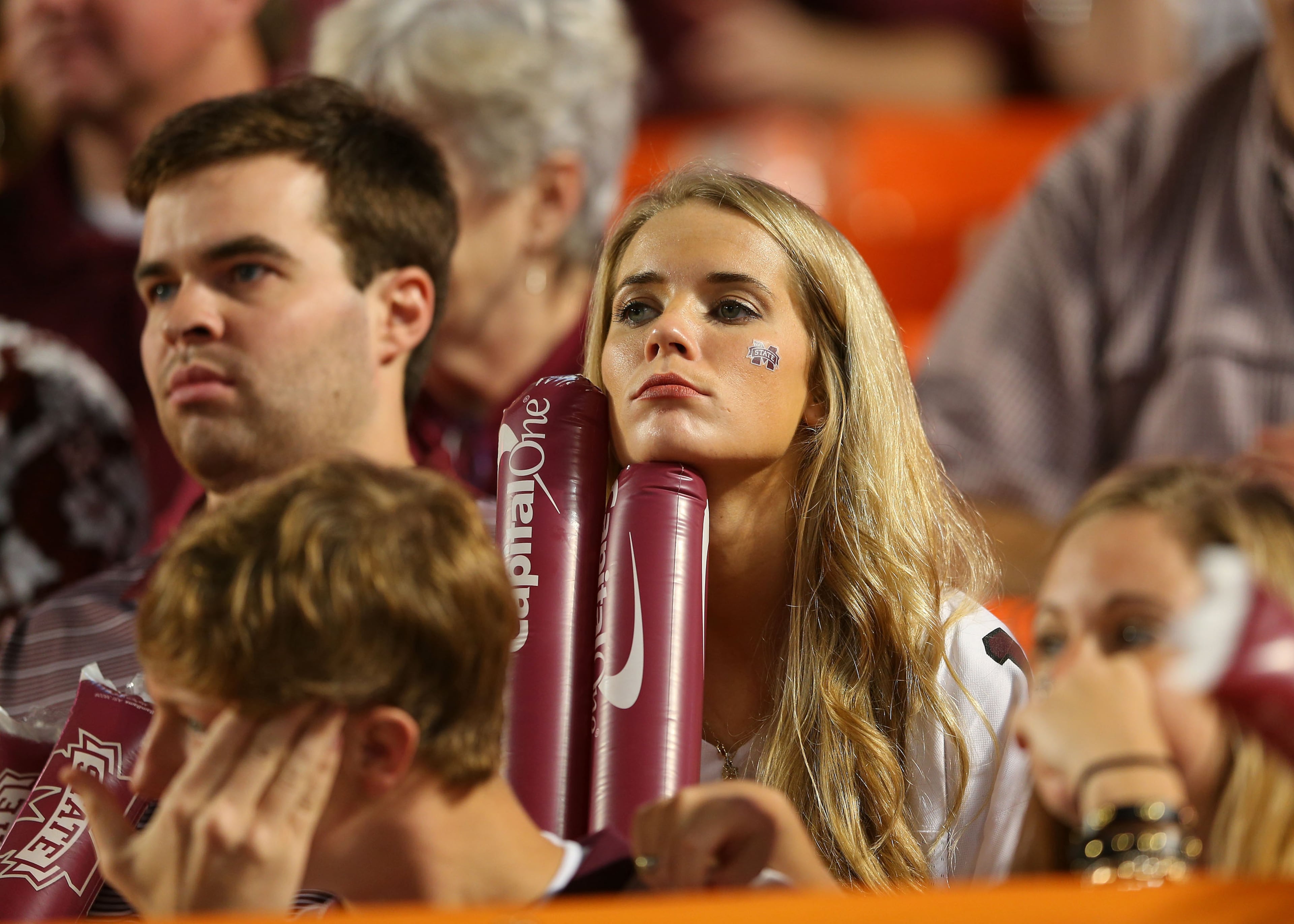 A Mississippi State Bulldogs fan looks on from the stands during the second half of the Capital One Orange Bowl game against the Georgia Tech Yellow Jackets at Sun Life Stadium on December 31, 2014 in Miami Gardens, Florida. (Photo by Mike Ehrmann/Getty Images)