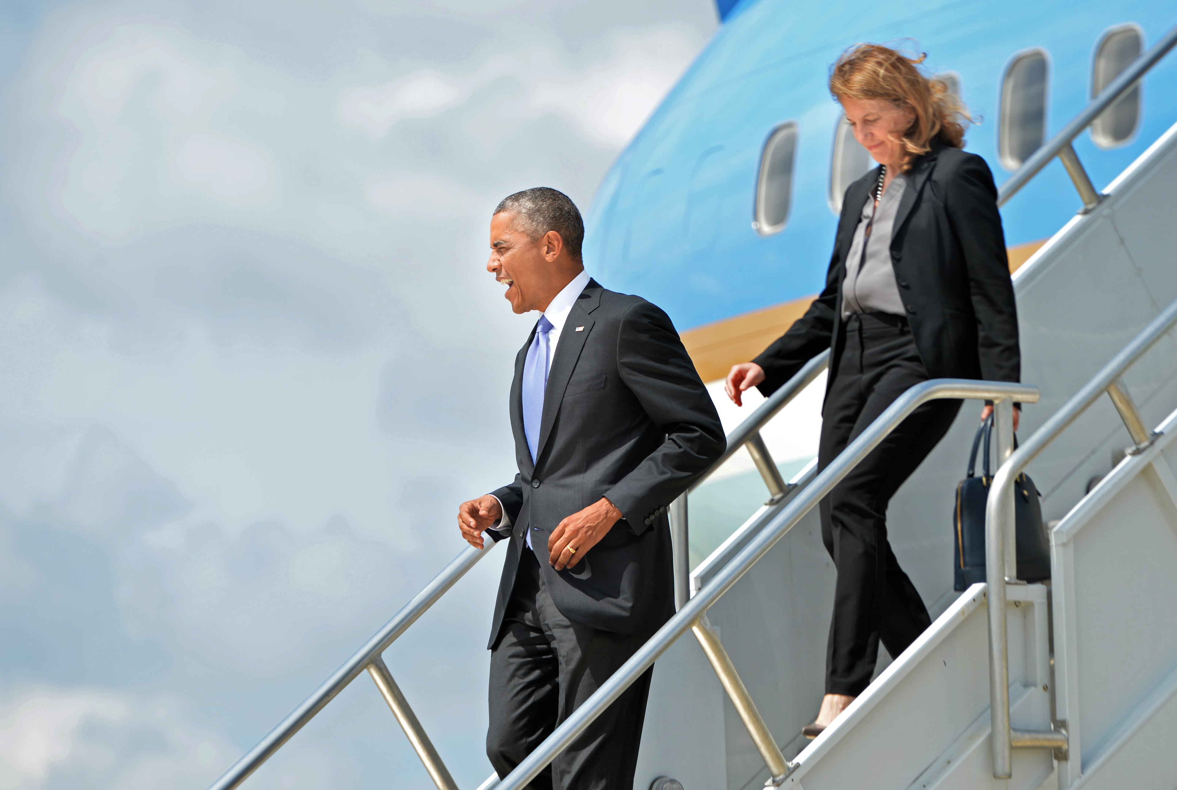 President Barack Obama arrives with Sylvia Burwell, Secretary of DHHS, on Air Force One at Hartsfield-Jackson International airport to visit the Centers for Disease Control and Prevention to receive a briefing on the outbreak of the Ebola virus in West Africa on Tuesday, September, 16, 2014.