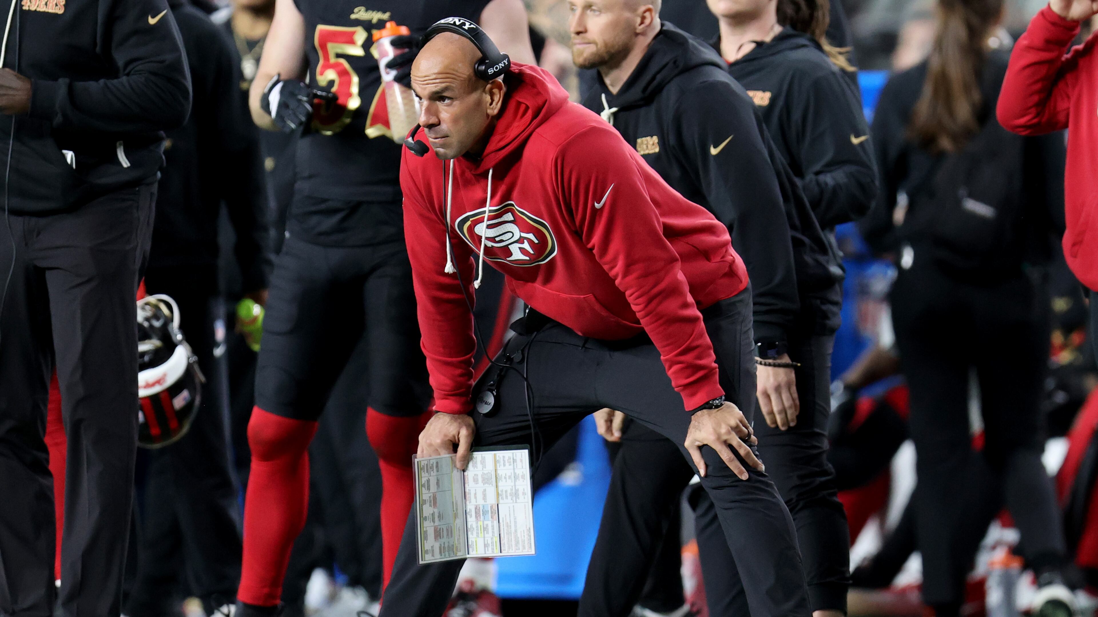 FILE - San Francisco 49ers defensive coordinator Robert Saleh stands on the sideline during an NFL football game against the Seattle Seahawks, Jan. 3, 2026, in Santa Clara, Calif. (AP Photo/Scot Tucker, File)