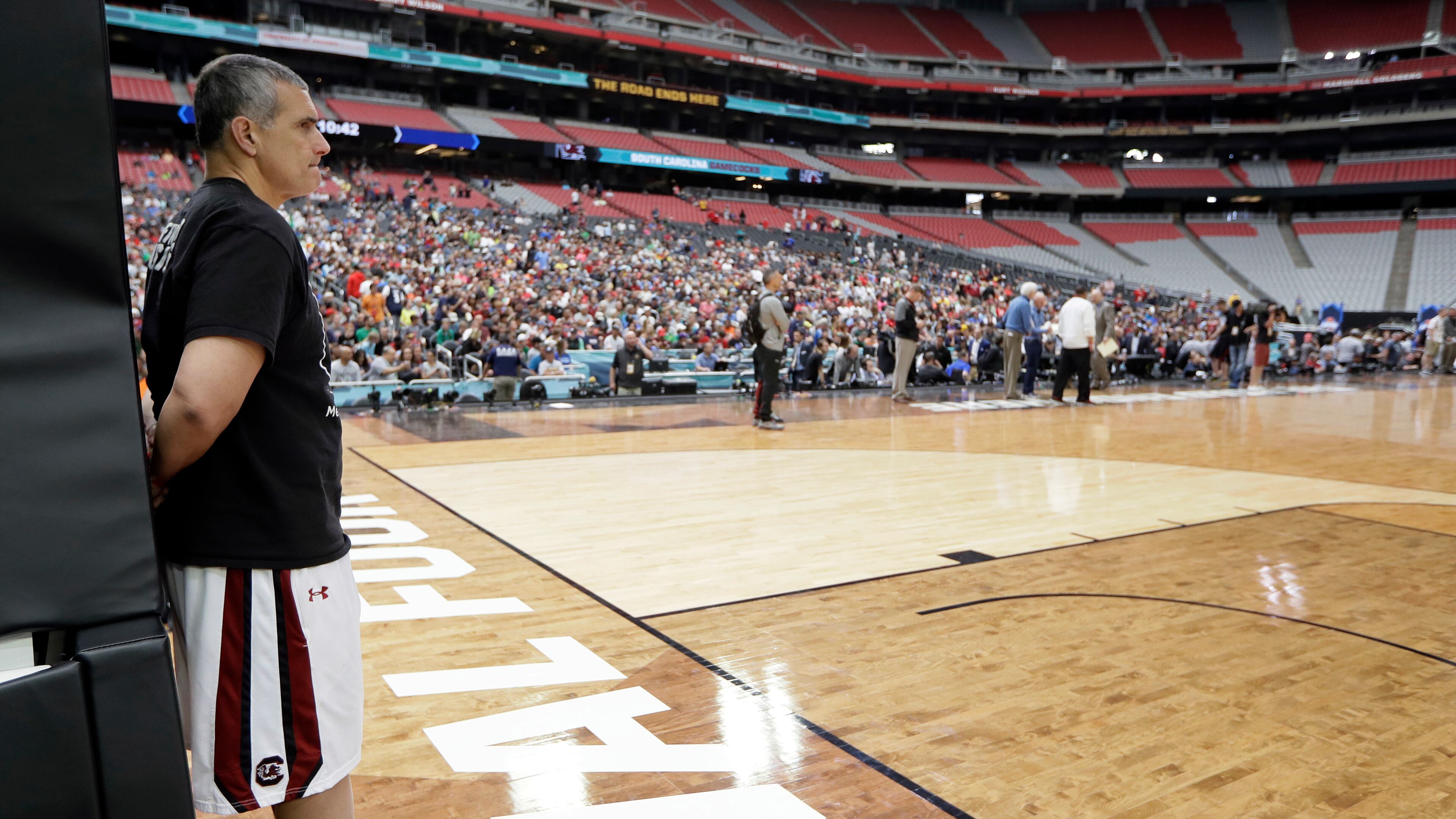 South Carolina coach Frank Martin watches during a practice session for the NCAA Final Four on Friday, March 31, 2017, in Glendale, Ariz. (AP Photo/Mark Humphrey)