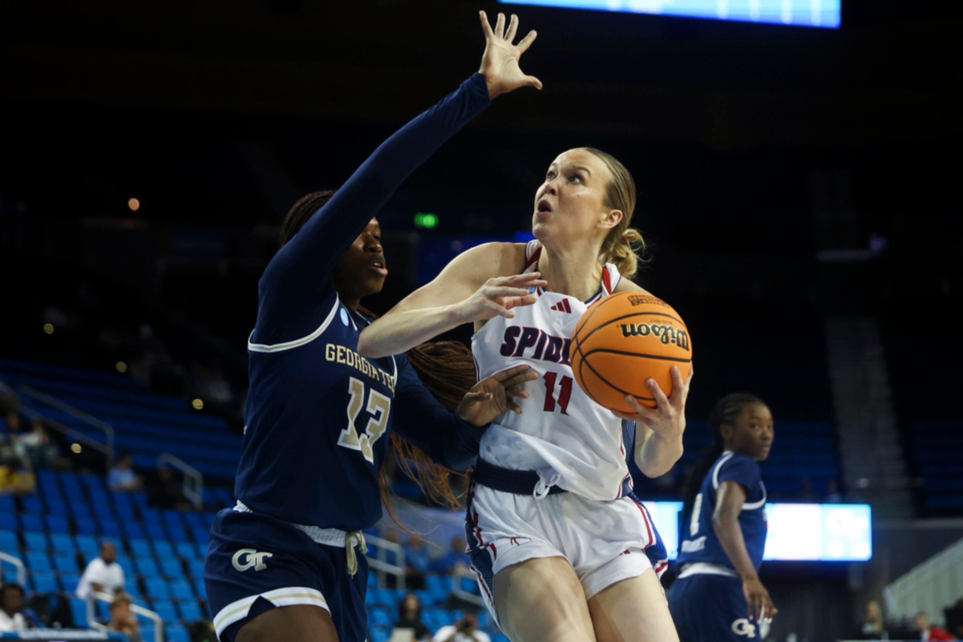 Richmond forward Anna Camden (11) drives against Georgia Tech forward Kayla Blackshear (13) during the first half in the first round of the NCAA college basketball tournament, Friday, March 21, 2025, in Los Angeles. (AP Photo/Jessie Alcheh)
