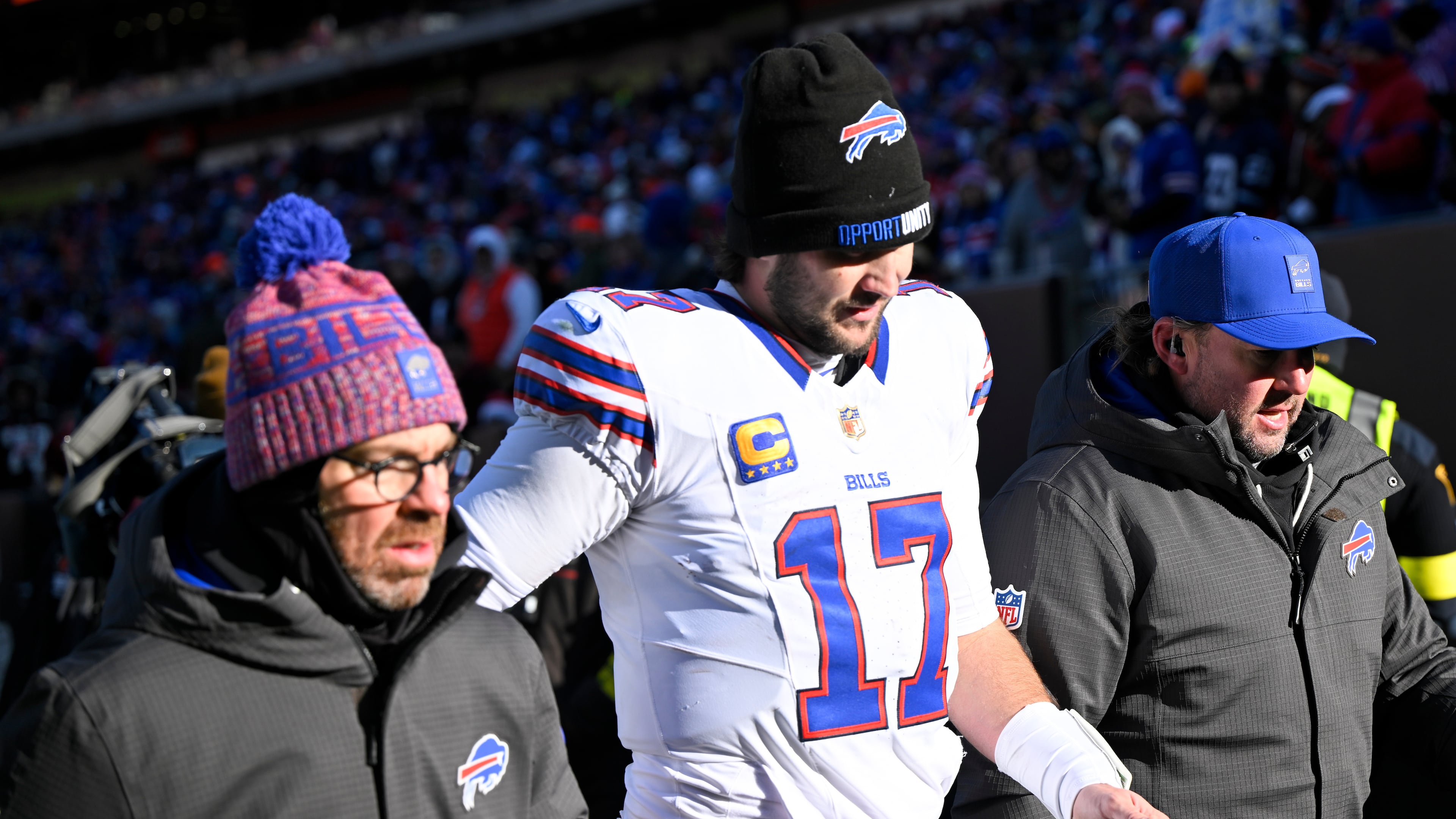 Buffalo Bills quarterback Josh Allen (17) leaves the field after an injury against the Cleveland Browns during the first half of an NFL football game in Cleveland, Sunday, Dec. 21, 2025. (AP Photo/David Richard)