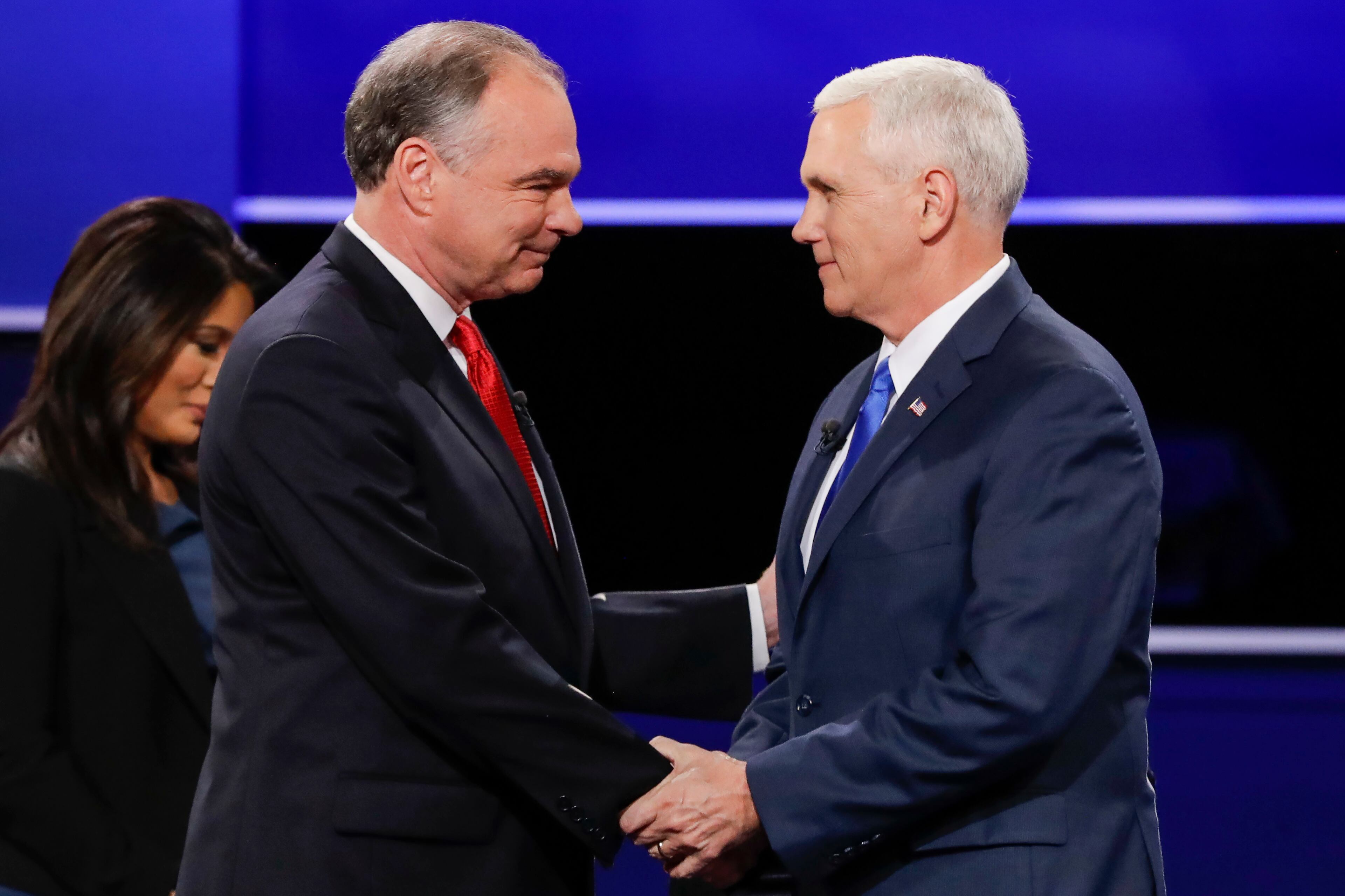 Republican vice presidential nominee Gov. Mike Pence, right, and Democratic vice presidential nominee Sen. Tim Kaine shake hands during the debate at Longwood University in Farmville, Va., Tuesday, Oct. 4, 2016. (AP Photo/David Goldman)
