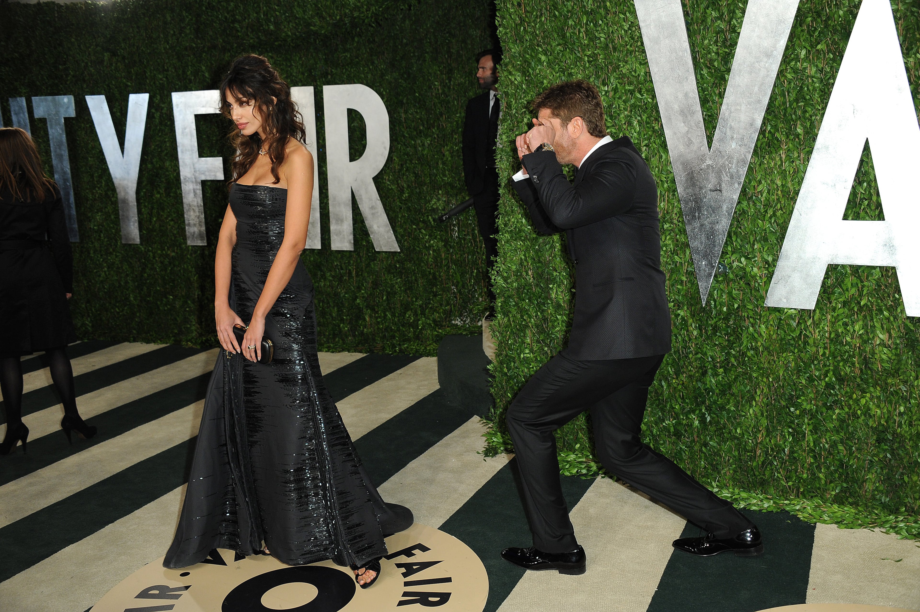 Gerard Butler and Madalina Ghenea arrive at the 2013 Vanity Fair Oscars Viewing and After Party on Sunday, Feb. 24 2013 at the Sunset Plaza Hotel in West Hollywood, Calif.