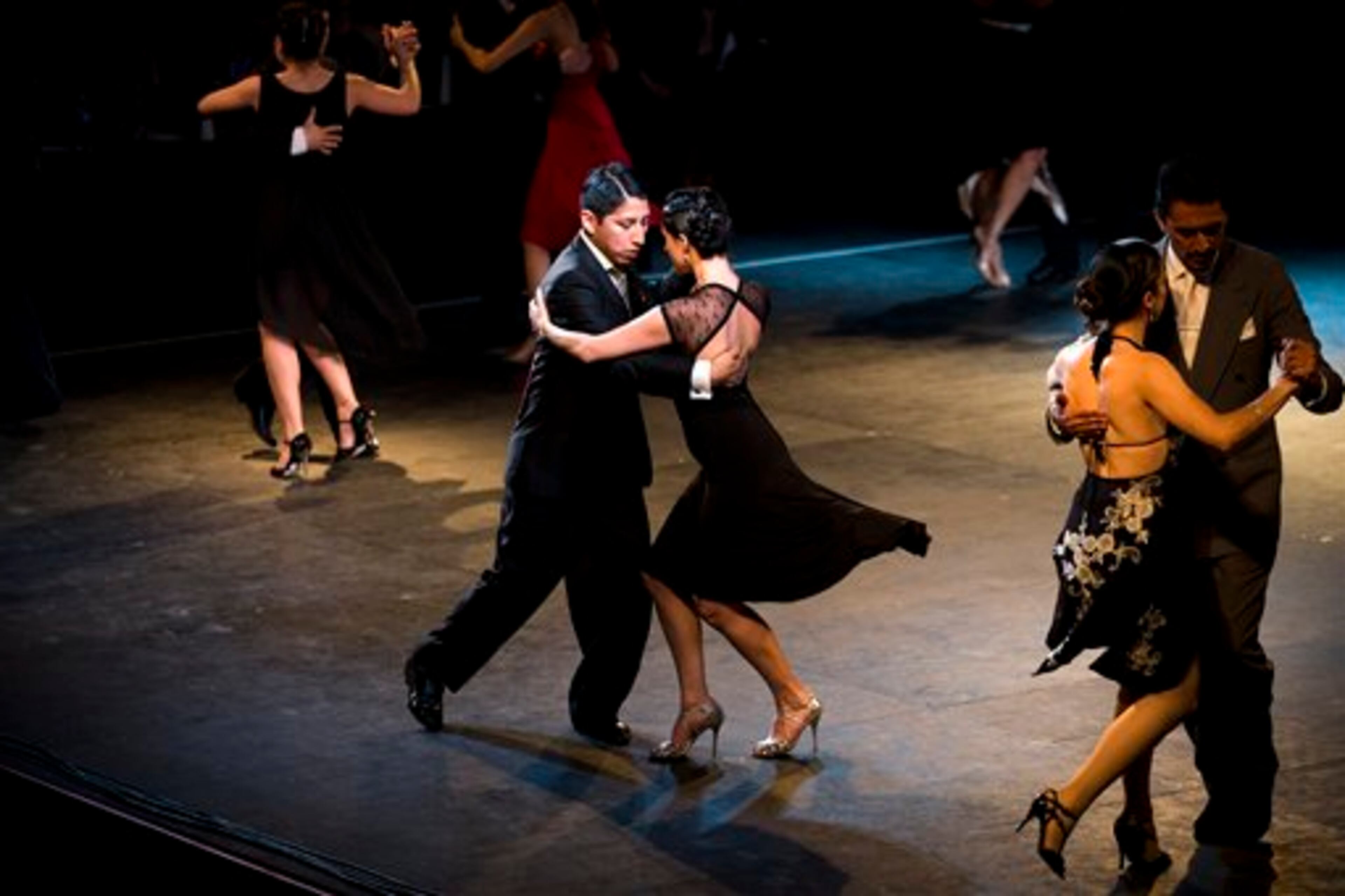 Couples dance in the salon category during the 2013 Tango World Championship in Buenos Aires, Argentina, Monday, Aug. 19, 2013. (AP Photo/Victor R. Caivano)