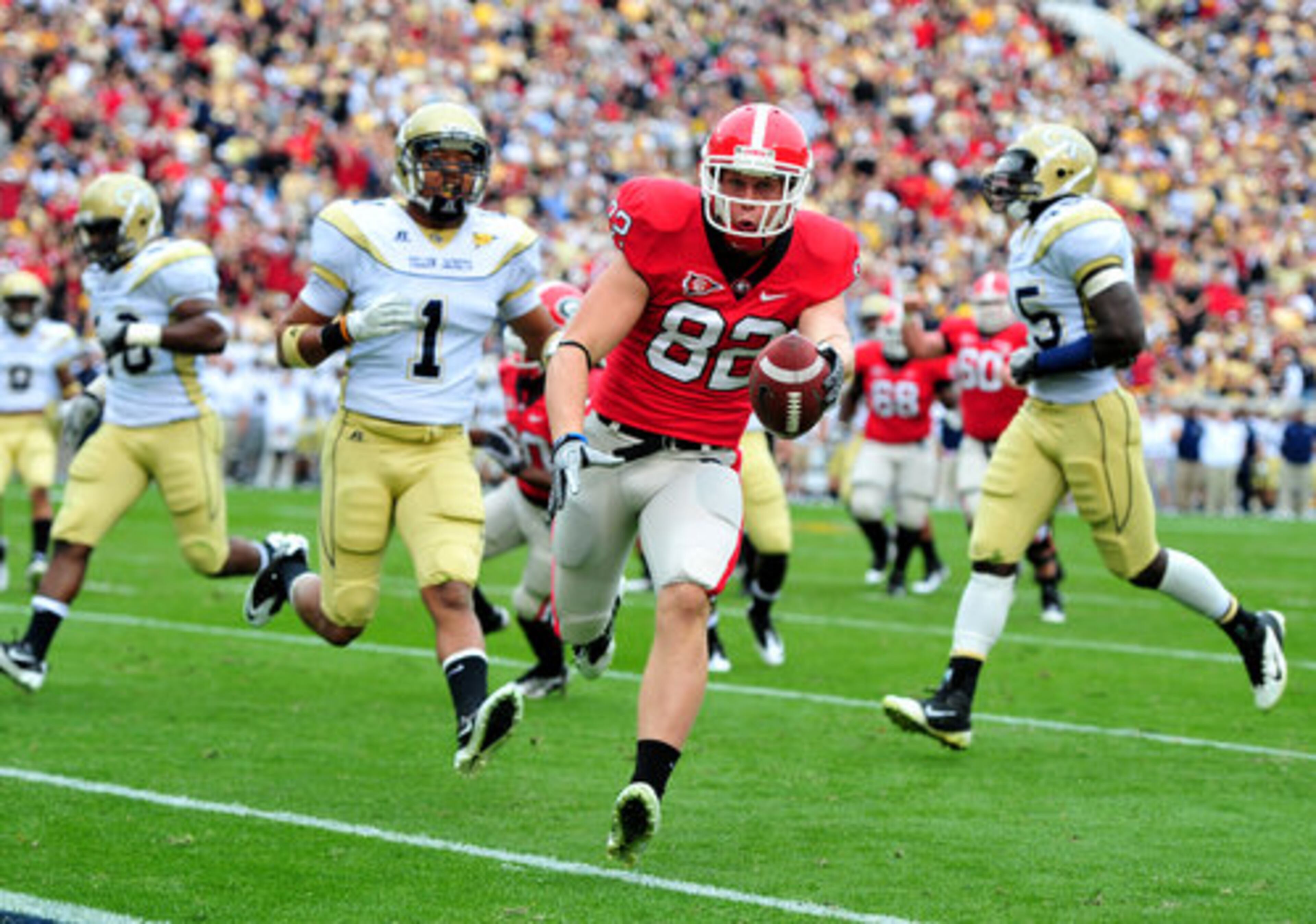 Michael Bennett scores on a 15-yard pass from Aaron Murray for UGA's first touchdown as the Bulldogs take on Georgia Tech on Nov. 26, 2011, at Grant Field.
