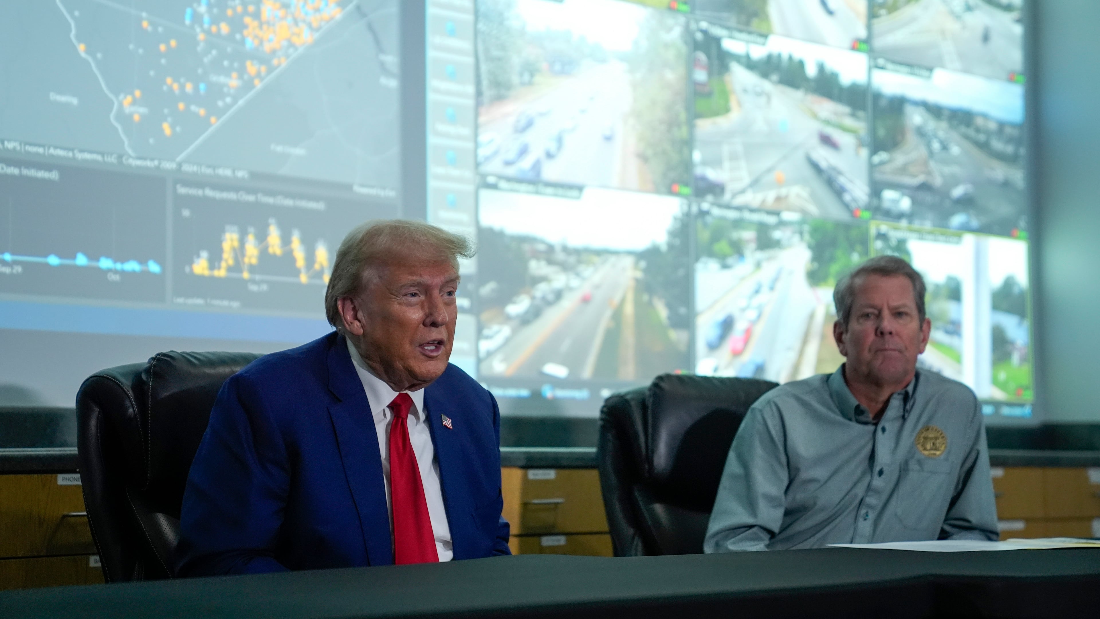 Gov. Brian Kemp (right) and then-Republican presidential nominee Donald Trump hold an October 2024 news conference after visiting areas impacted by Hurricane Helene in Evans. (Evan Vucci/AP)