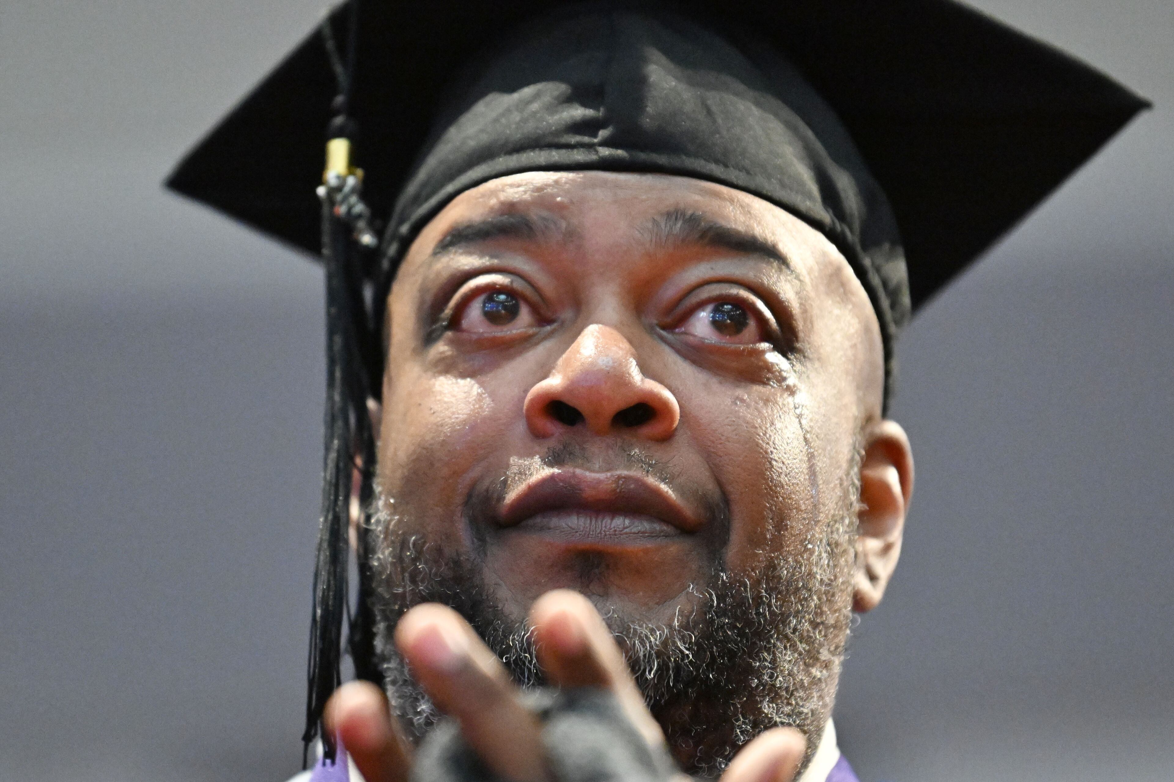 Graduates react as Bishop T.D. Jakes delivers a commencement address during 2025 Morris Brown College commencement exercises at Saint Philip A.M.E. Church, Saturday, May 17, 2025, in Atlanta. (Hyosub Shin / AJC)