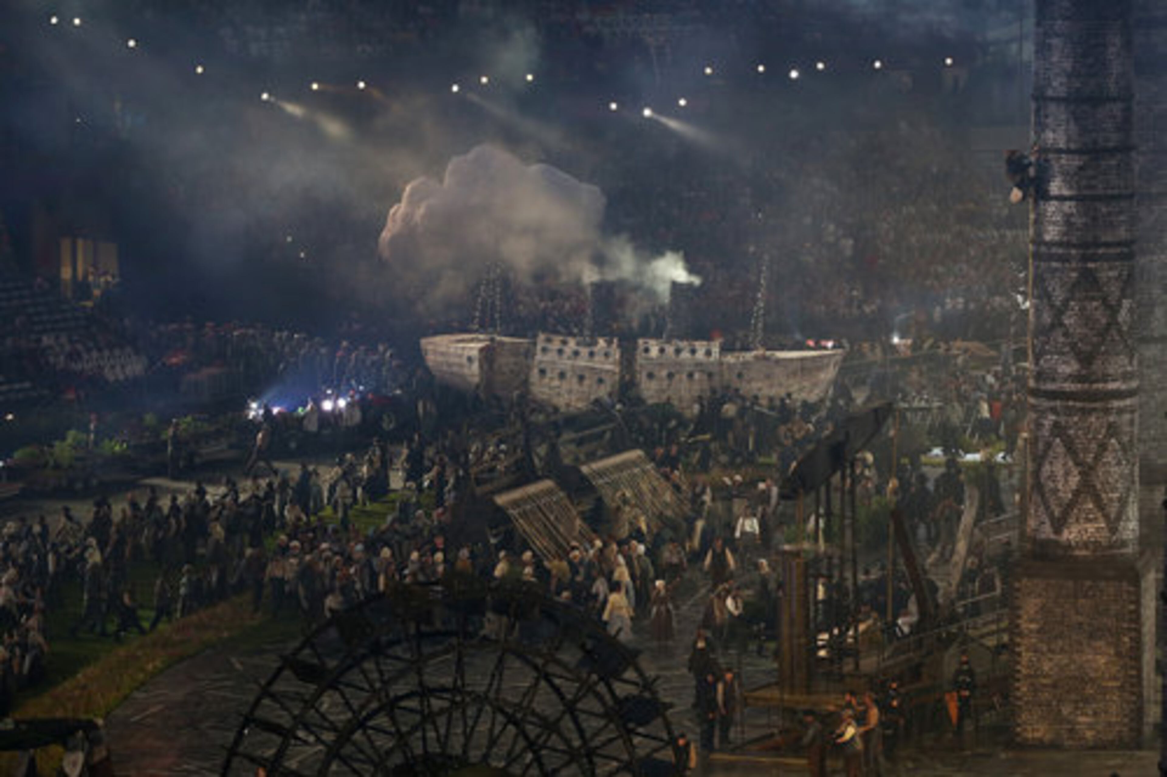 Performers take part in pandemonium, depicting the Industrial Revolution during the Opening Ceremony.
