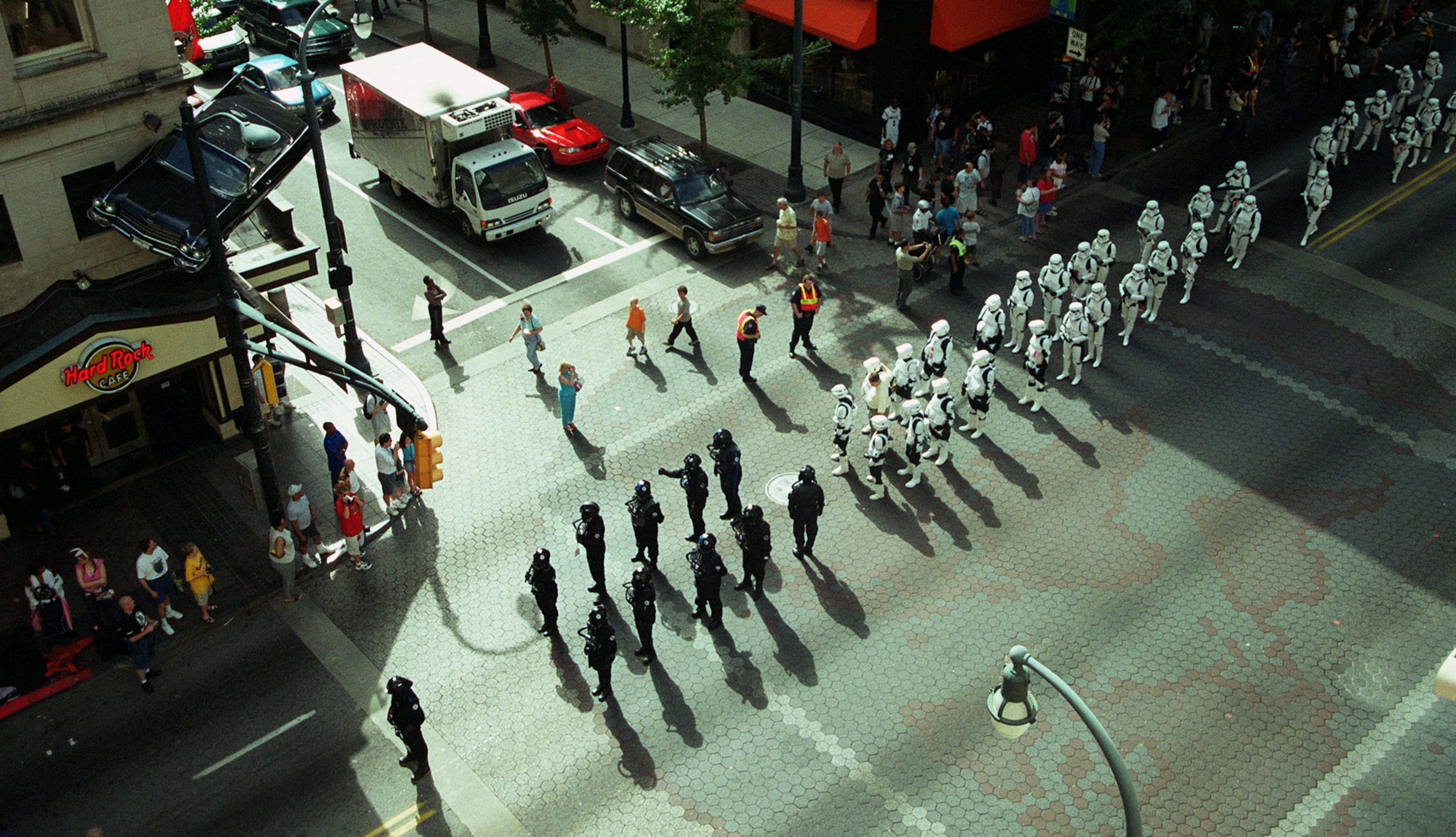 Mass quantities of Dragon Con convention-goers dressed as Storm Troopers, along with other "Star Wars" characters, march down Peachtree Street during the Dragon Con Parade on Aug. 30, 2003. (Rebecca Reid for the AJC)