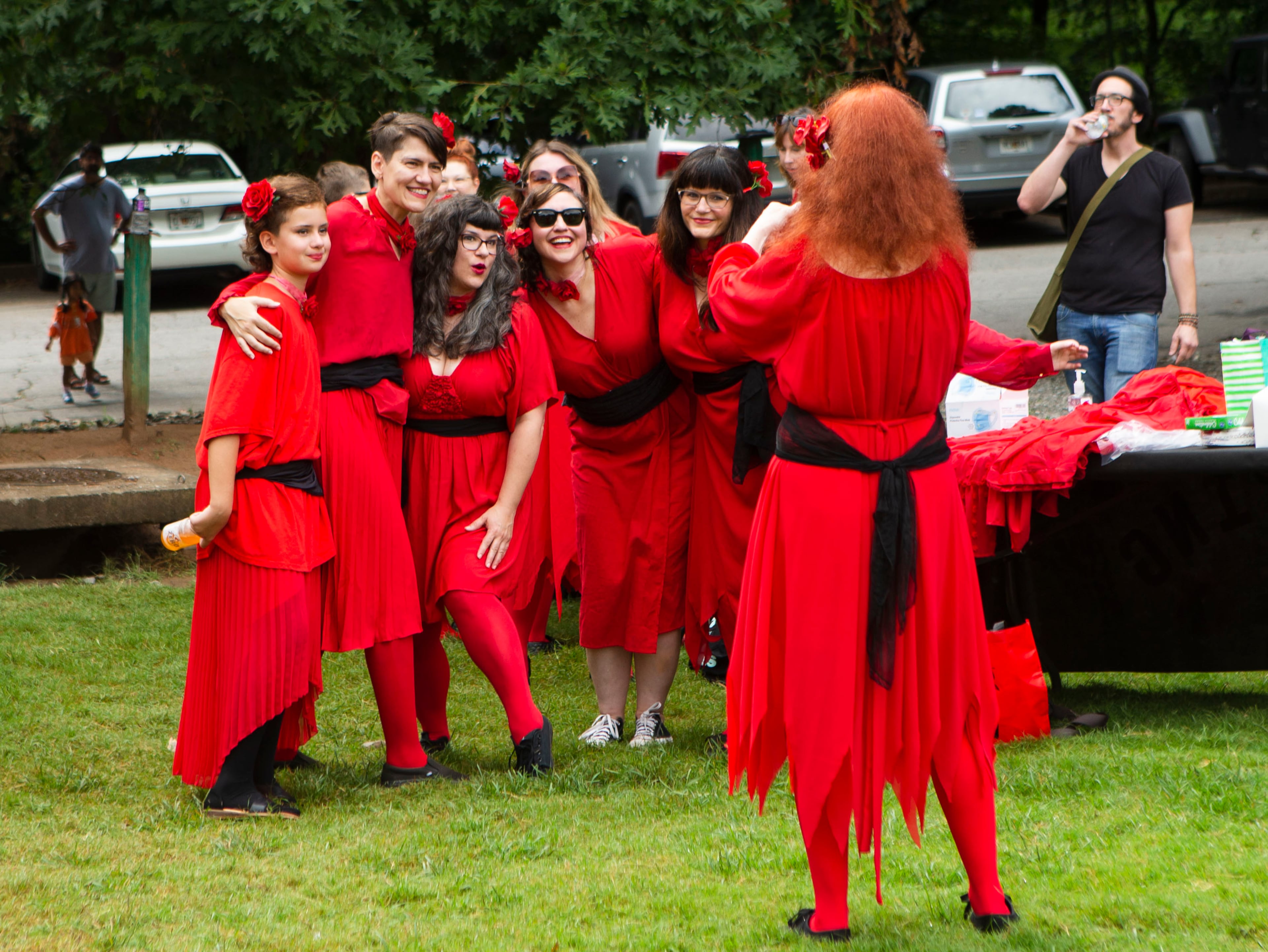 Kate Bush fans pose for a photo before a group dance to celebrate the seventh annual international "Most Wuthering Heights Day Ever," on Saturday, July 30, 2022, in Candler Park in Atlanta. The event celebrates Kate Bush's 1978 song "Wuthering Heights" with events in more than 40 cities around the world. CHRISTINA MATACOTTA FOR THE ATLANTA JOURNAL-CONSTITUTION
