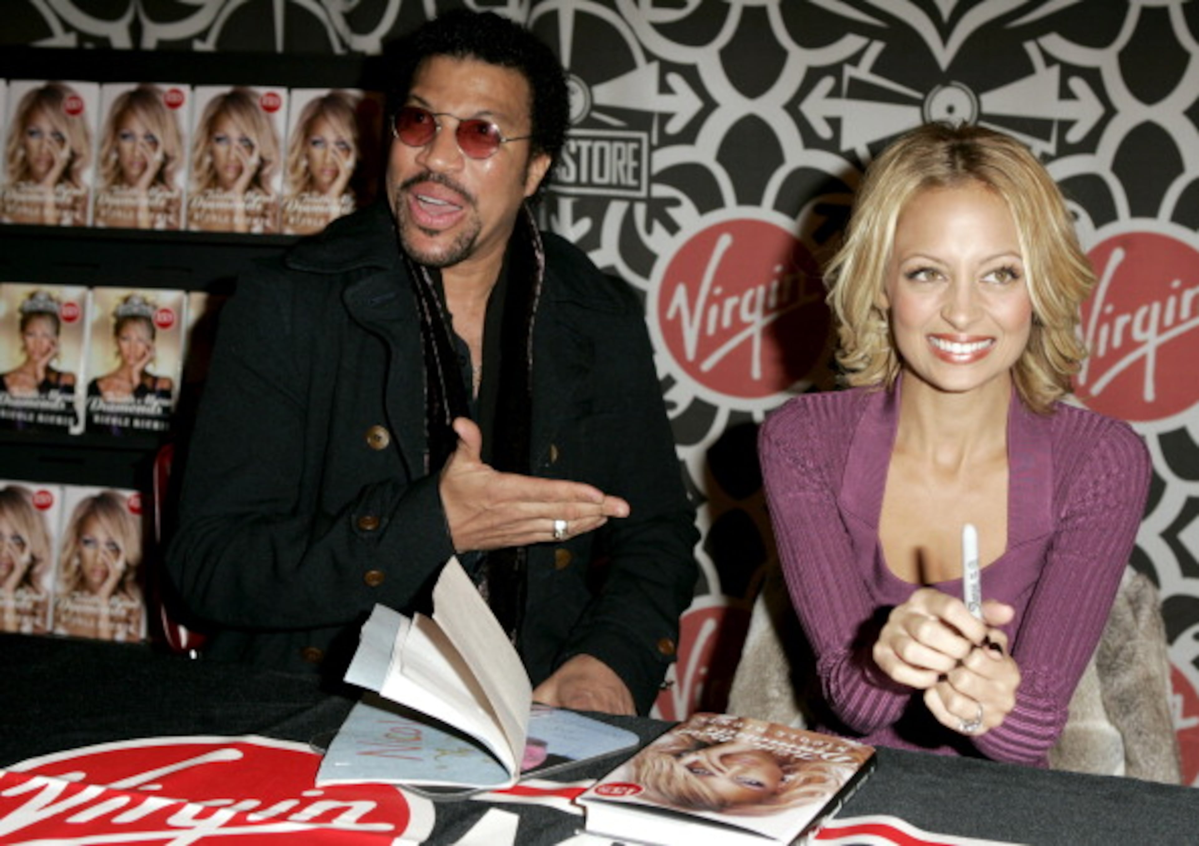Lionel Richie and Nicole Richie during Nicole Richie Signs Her Book "The Truth About Diamonds" at Virgin Megastore in New York City at Virgin Megastore Times Square in New York City, New York, United States. (Photo by J. Vespa/WireImage)