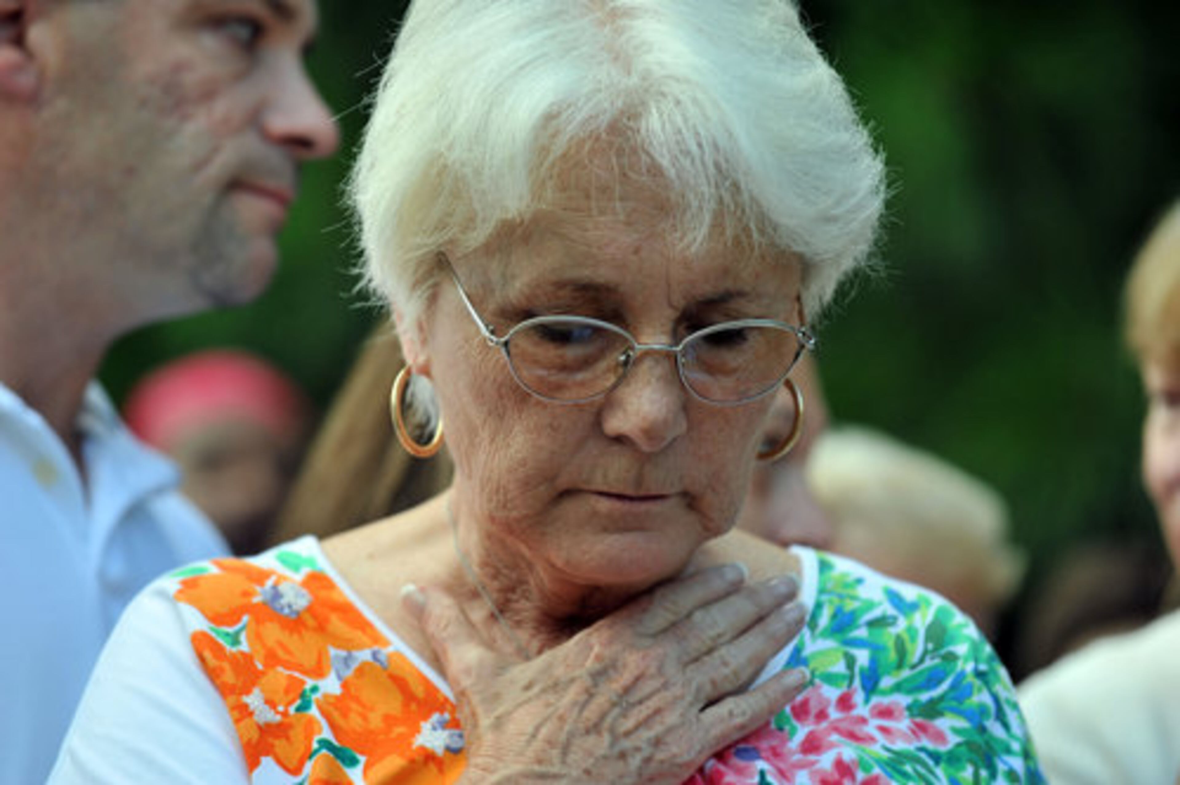 Harriett Garrett, the mother of Nique Leili, gets emotional during the candlelight vigil.