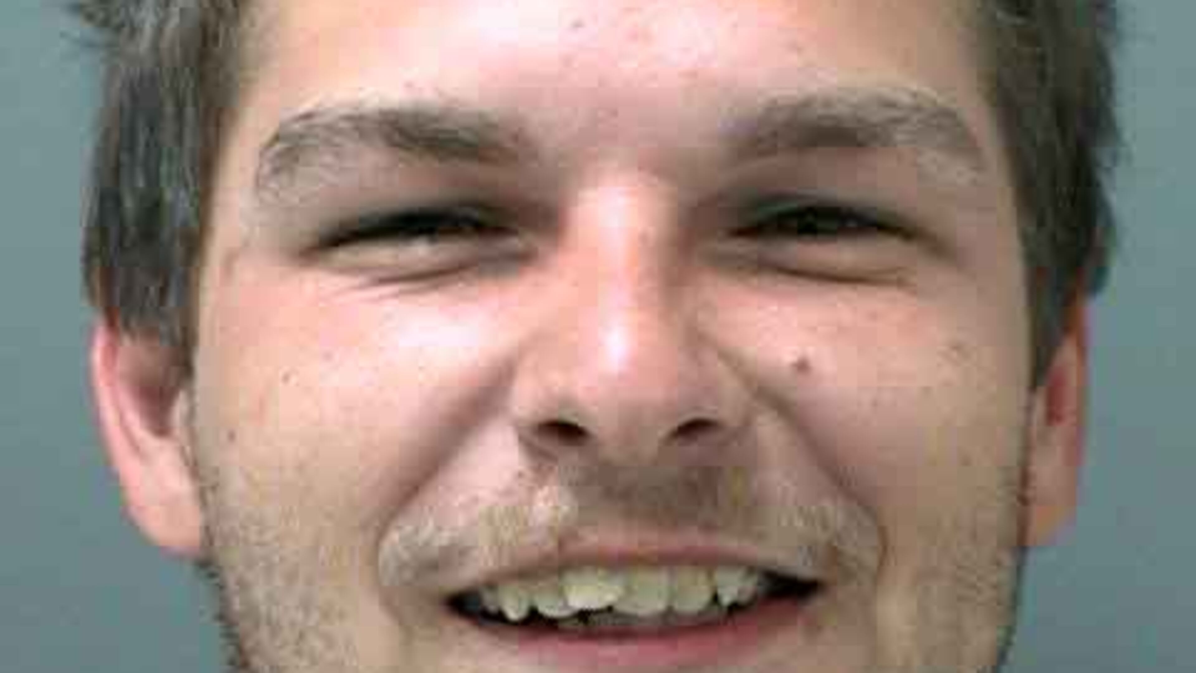 Michael Dotson, 22, of Woodstock, was arrested and charged with simple battery, according to police. (Credit: Cherokee County Sheriff’s Office)