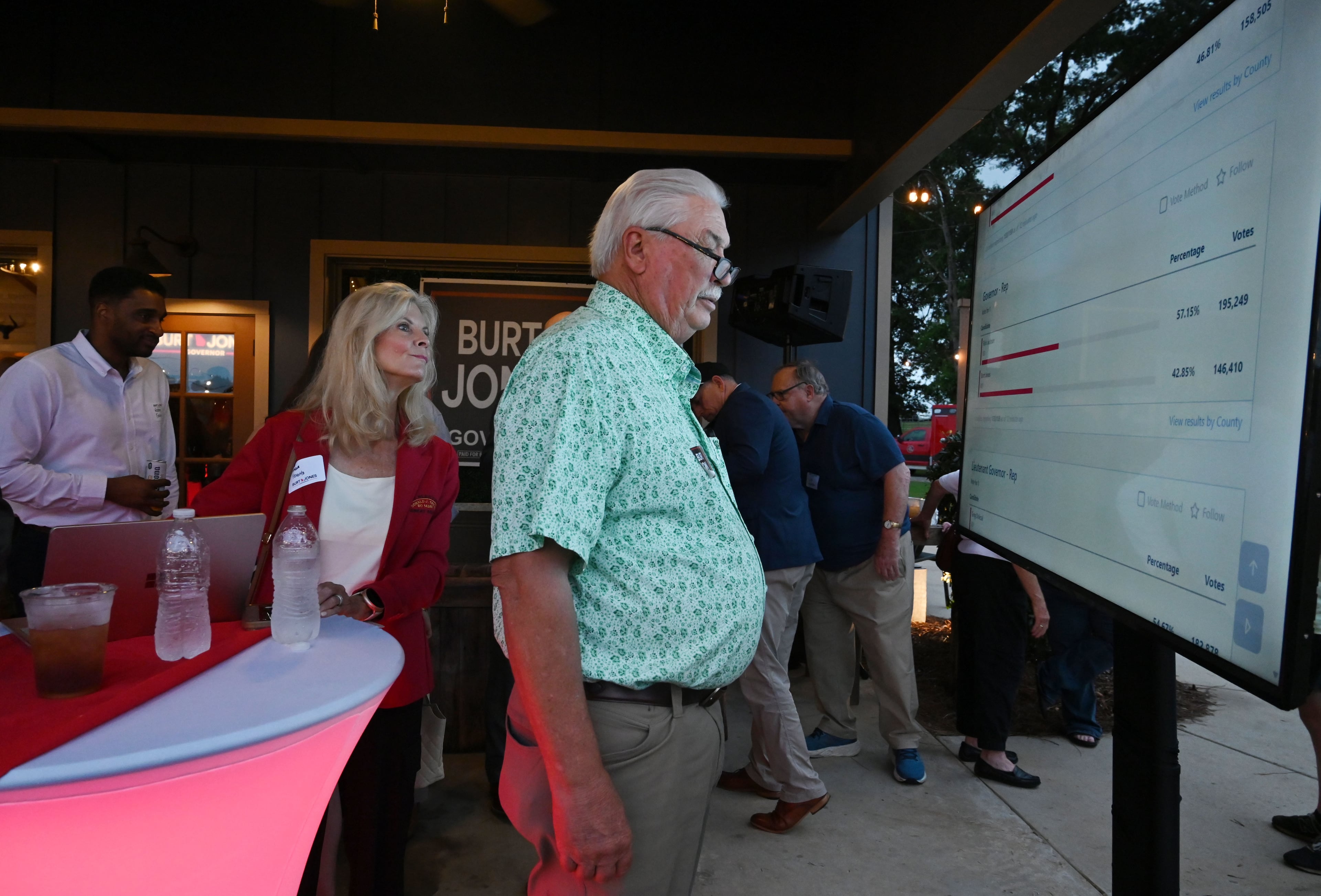 Georgia state Sen. Lee Anderson watches election results on a screen during an election night watch party for Georgia gubernatorial candidate Burt Jones at The Rivers Ranch during Georgia’s primary runoff on Tuesday, June 16, 2026, in Jackson. (Hyosub Shin/AJC)