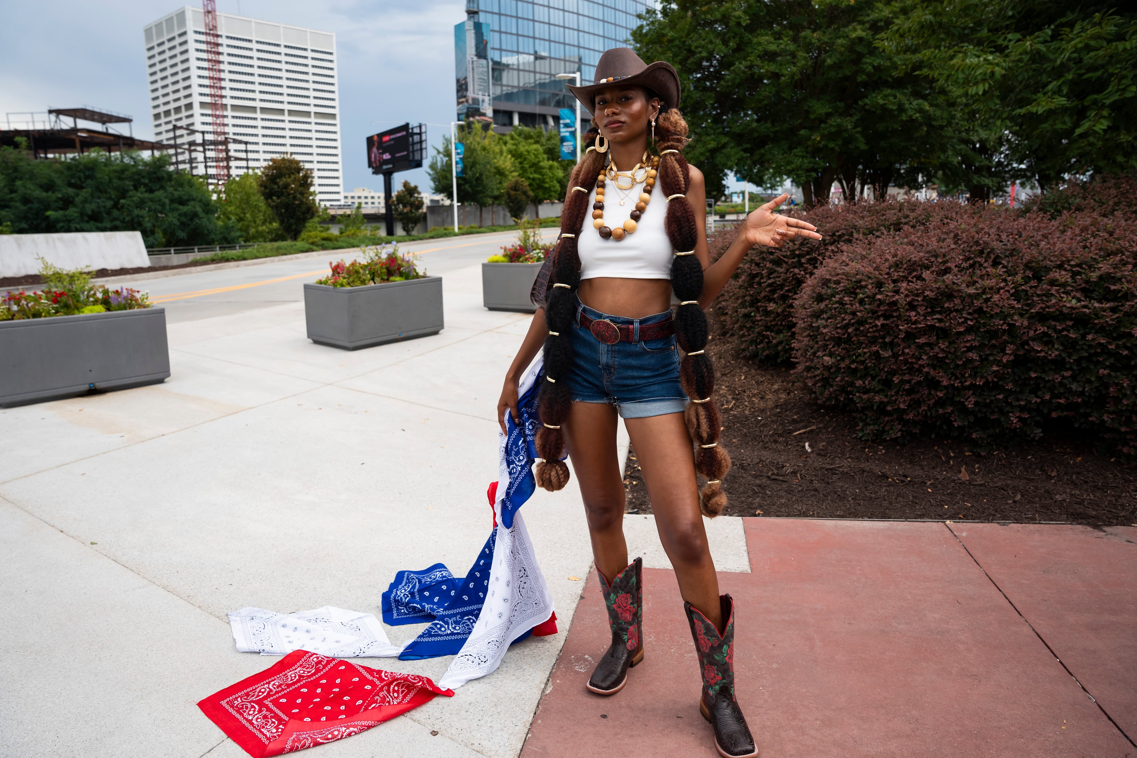 Lora poses in line outside Beyoncé's Cowboy Carter concert in Atlanta on Thursday, July 10, 2025. (Olivia Bowdoin for the AJC).