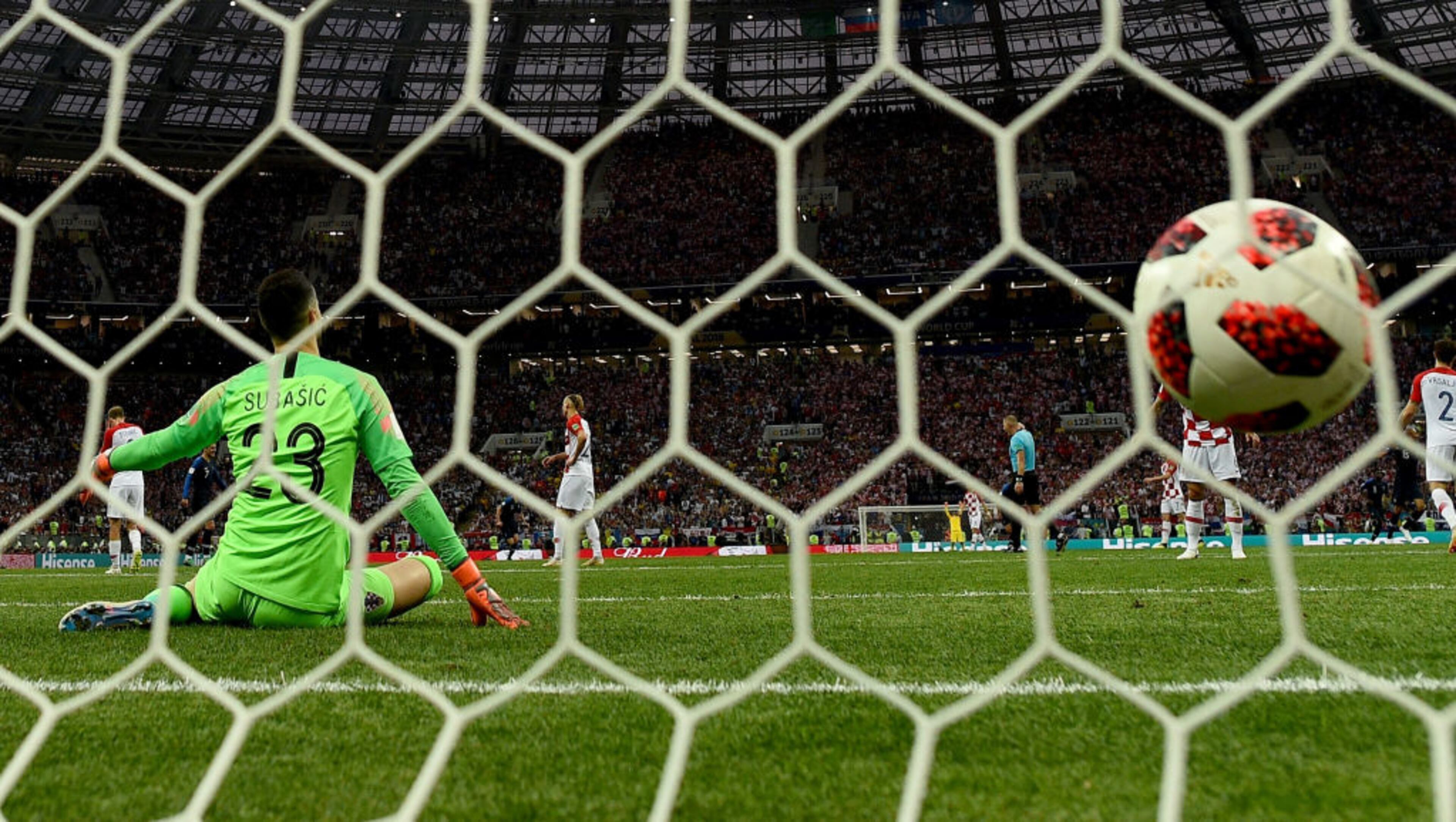 MOSCOW, RUSSIA - JULY 15: Kylian Mbappe of France scores his sides fourth goal past Danijel Subasic of Croatia during the 2018 FIFA World Cup Final between France and Croatia at Luzhniki Stadium on July 15, 2018 in Moscow, Russia. (Photo by Shaun Botterill/Getty Images)