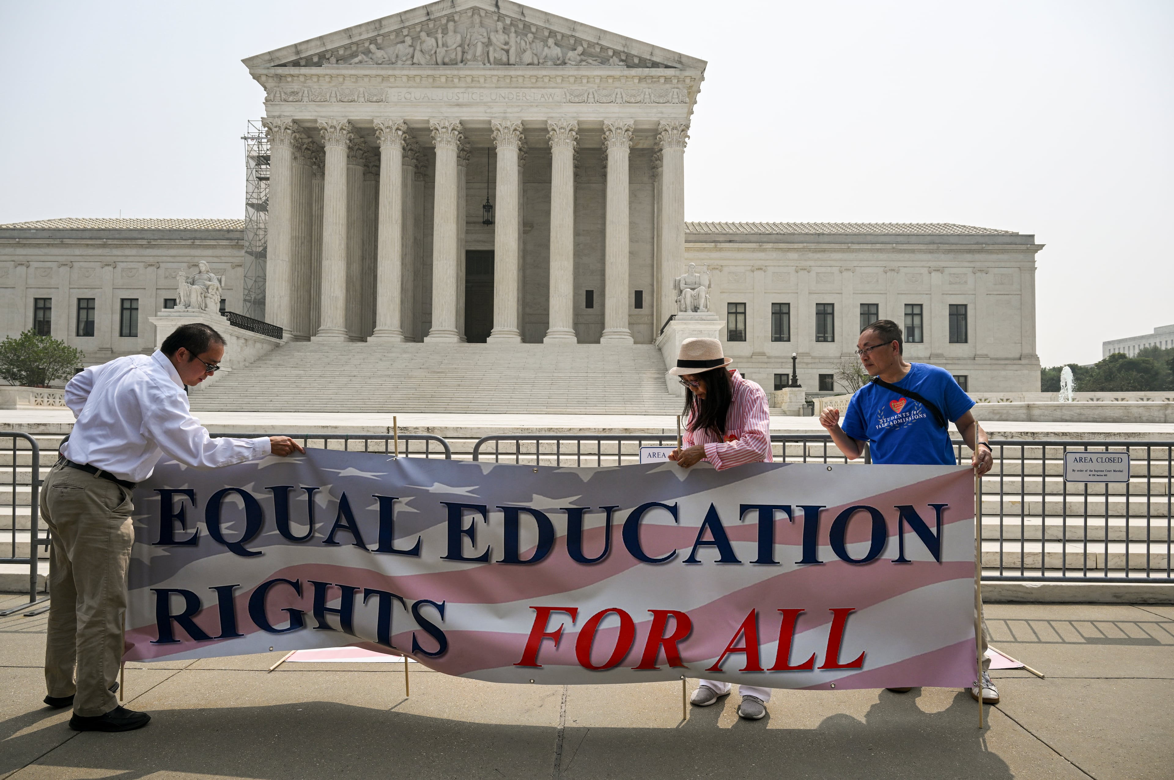 Activists from Students for Fair Admissions celebrate the affirmative action opinion outside the U.S. Supreme Court in Washington, June 29, 2023. (Kenny Holston/The New York Times)