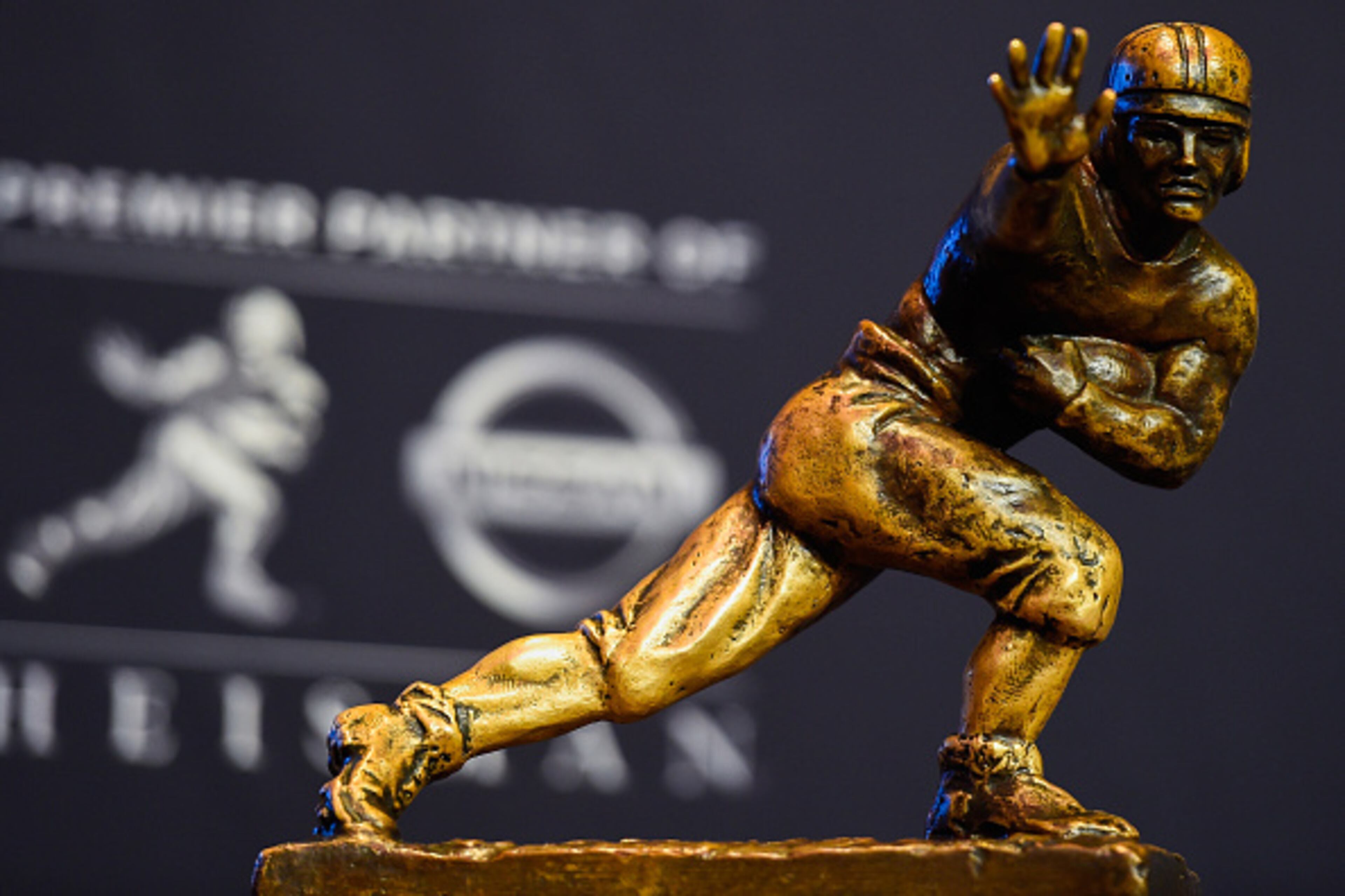 NEW YORK, NY - DECEMBER 13: The Heisman Trophy sits on a stand before a press confrence at the New York Marriott Marquis on December 13, 2014 in New York City. (Photo by Alex Goodlett/Getty Images)
