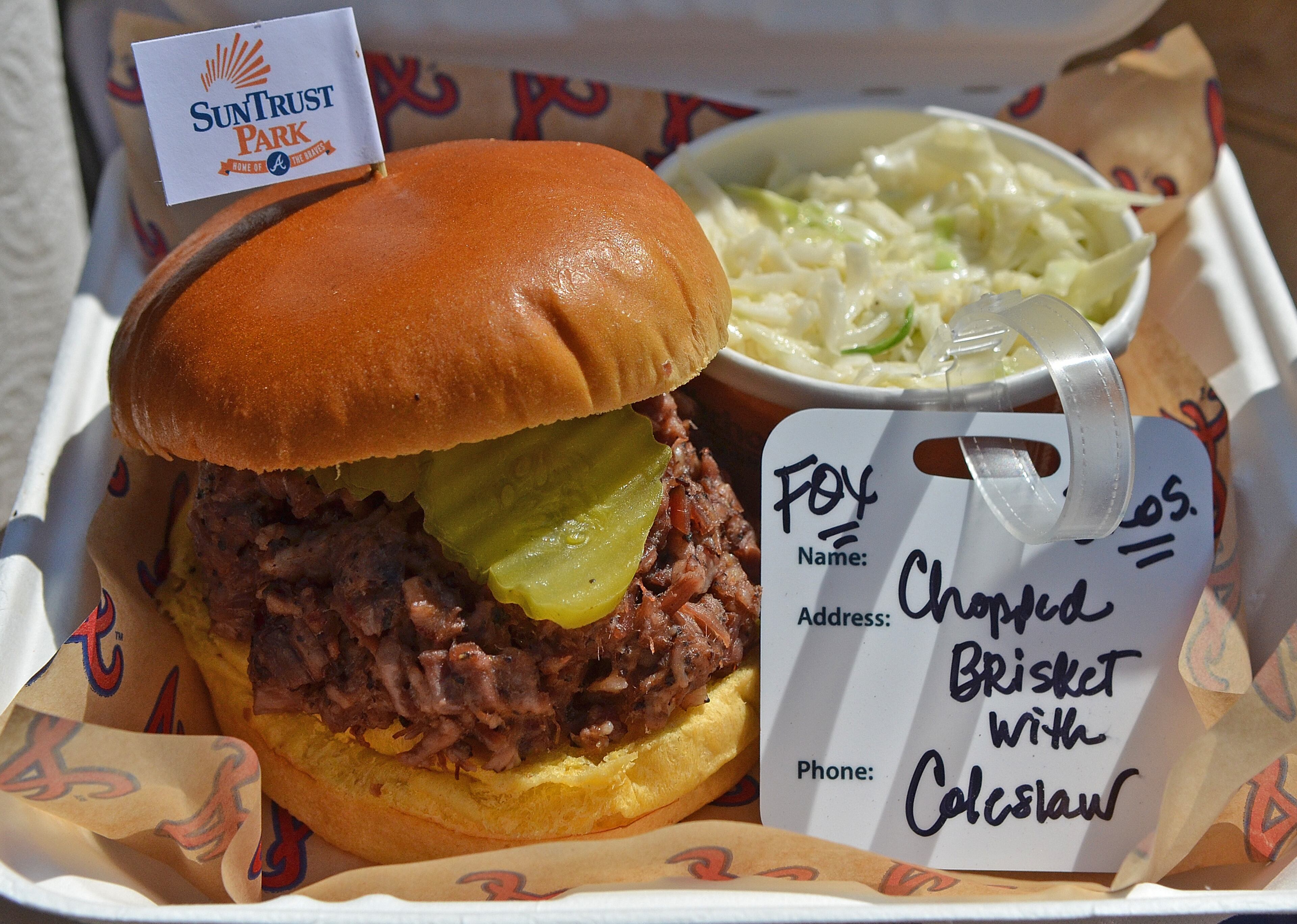 170323 Atlanta, Ga (Suntrust Park): Fox Bros. Chopped Brisket with Coleslaw will be one of the offerings for the 2017 Braves season at Suntrust Park. The Atlanta Braves and Delaware North Sportservice, the hospitality and food service provider for the Atlanta Braves, host a tasting tour of the soon to be opened Suntrust Park to reveal the food and beverage options available for the 2017 season. All photos taken Thursday March 23, 2017 at Suntrust Park 755 Battery Avenue, Smyrna, Ga 30339. (Chris Hunt/Special) for story slugged 041417Bravesdishes