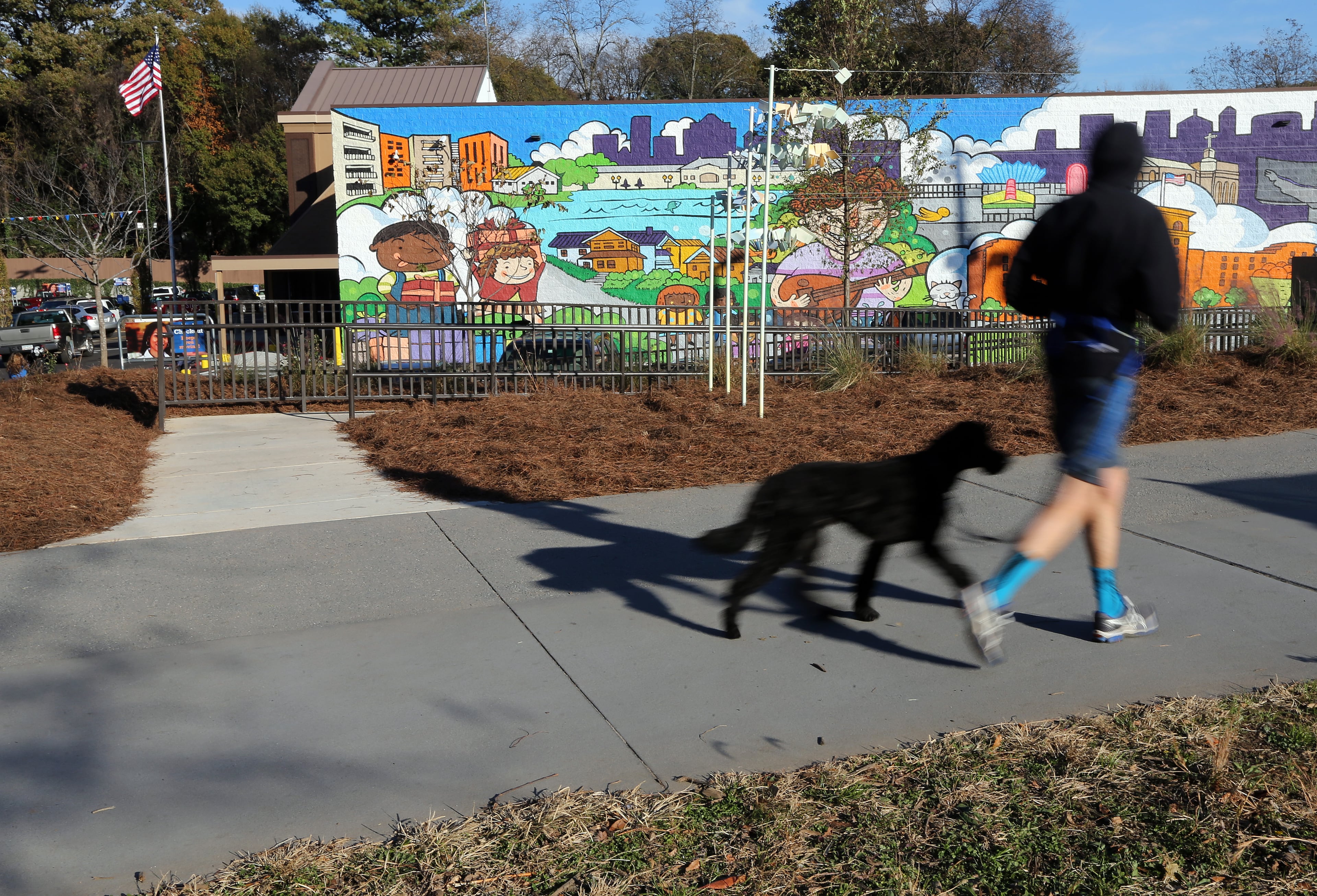 The Kroger on Ponce De Leon Avenue, nicknamed ‘Murder Kroger’, recently added a mural, an access ramp to the Beltline, bike racks and a bicycle repair station. A Kroger spokesman said they would prefer to be known as ‘Beltline Kroger.’ BEN GRAY / BGRAY@AJC.COM