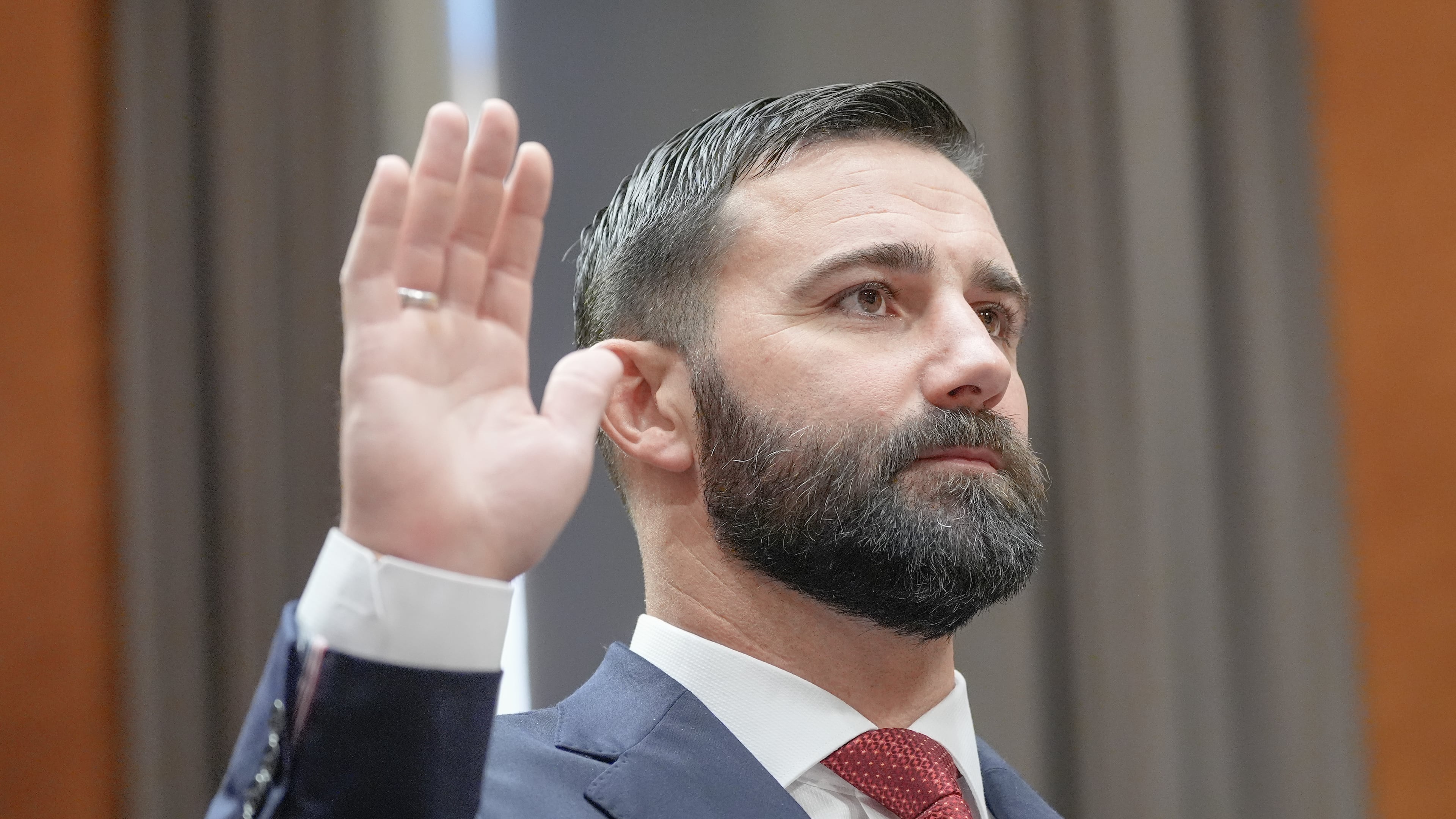 Cameron Hamilton sworn during a Senate Committee on Homeland Security and Government Affairs Committee hearing to examine his nomination to be Administrator of the Federal Emergency Management Agency, Wednesday, June 17, 2026, on Capitol Hill in Washington. (AP Photo/Mariam Zuhaib)