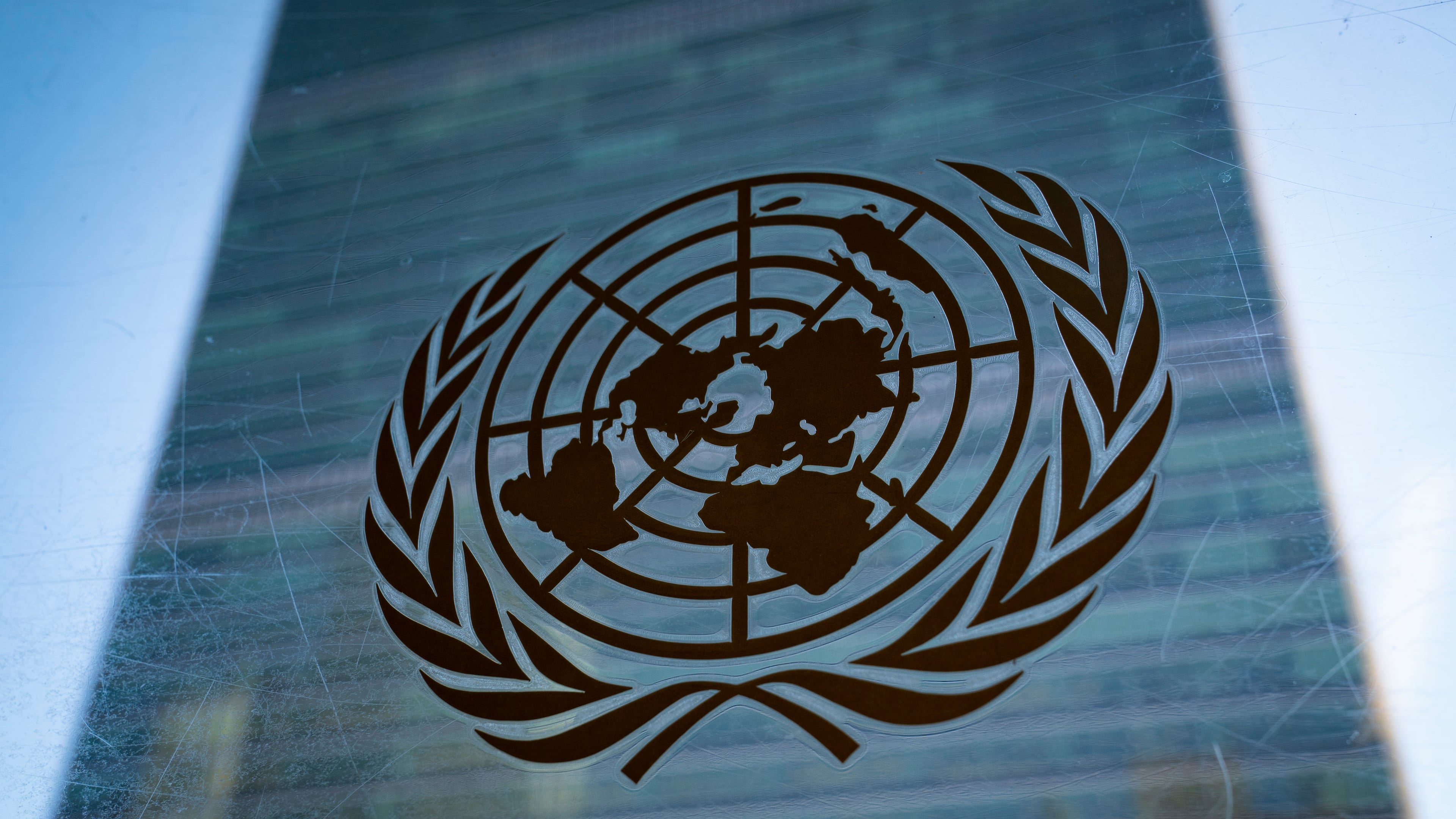 FILE - The symbol of the United Nations is displayed outside the Secretariat Building, Feb. 28, 2022, at United Nations Headquarters. (AP Photo/John Minchillo, File)