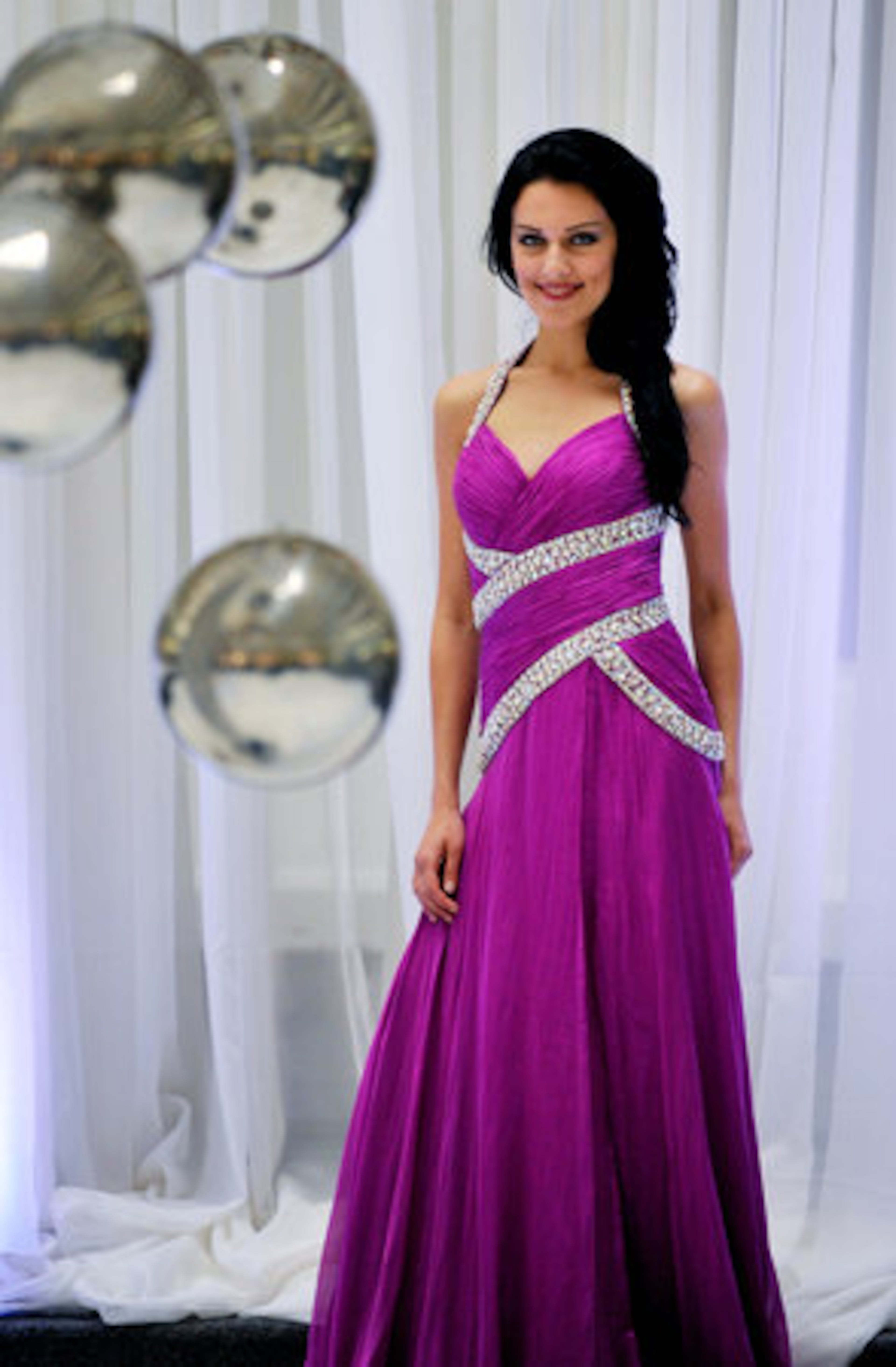 This year's prom season has seen a wave of one shoulder, halter and strapless gowns in prints, rich jewel tones and bright colors. Be the belle of the ball in a standout magenta gown with deep scoop back. About $800 by Prima Donna Collection. Find a similar style at Bravura in Marietta or Alpharetta and Cinderella's Closet in Lilburn.