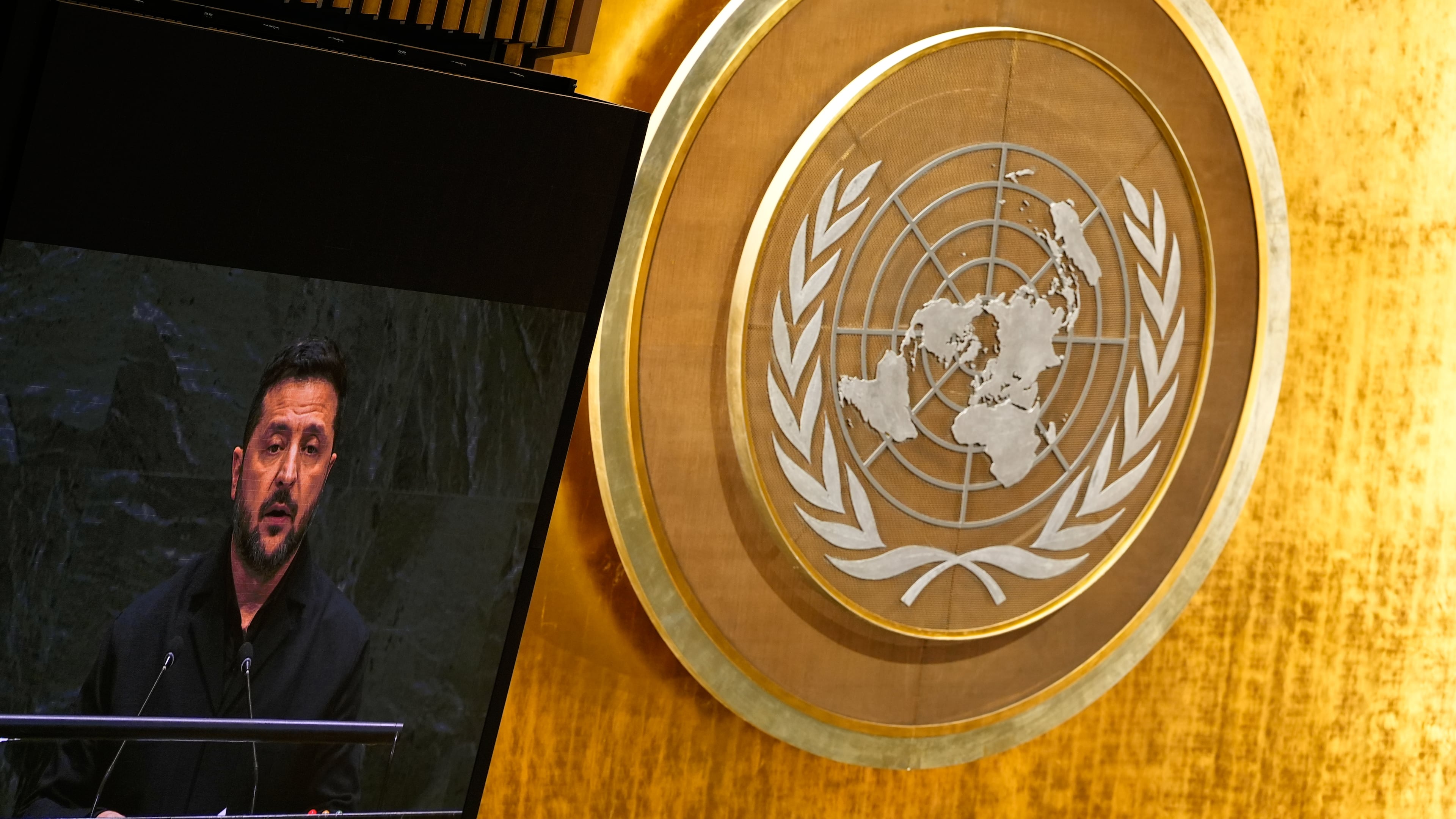 Ukraine's President Volodymyr Zelenskyy is seen on a video monitor as he speaks during the 81st session of the United Nations General Assembly at United Nations headquarters, Wednesday, Sept. 23, 2026. (AP Photo/Seth Wenig)