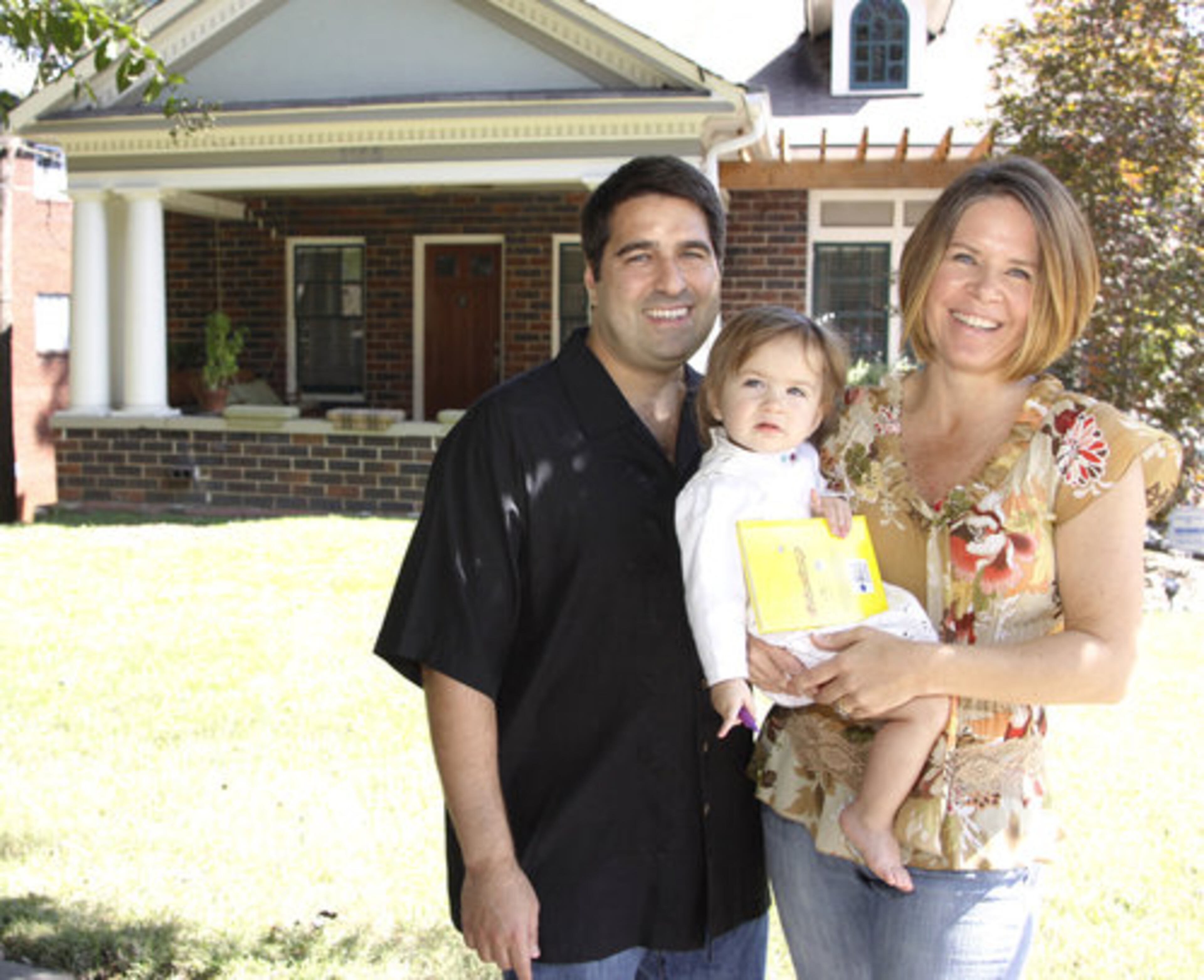 Marci and Joseph White (pictured with daughter Lily) say their Virginia Highland home was built in 1910 by baseball legend Ty Cobb for his mother Amanda Chitwood Cobb, who lived there until her passing in 1936. She lived here with Ty's younger brother, Paul Cobb, and his sister, Florence Cobb.